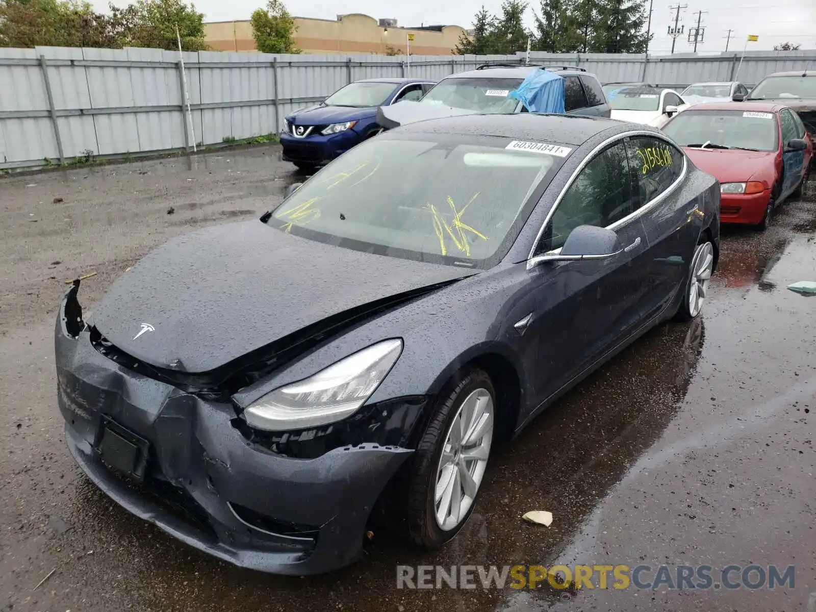 2 Photograph of a damaged car 5YJ3E1EA7LF670186 TESLA MODEL 3 2020