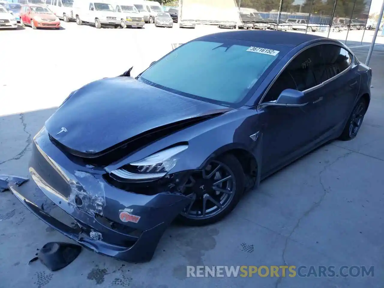 2 Photograph of a damaged car 5YJ3E1EA7LF704997 TESLA MODEL 3 2020