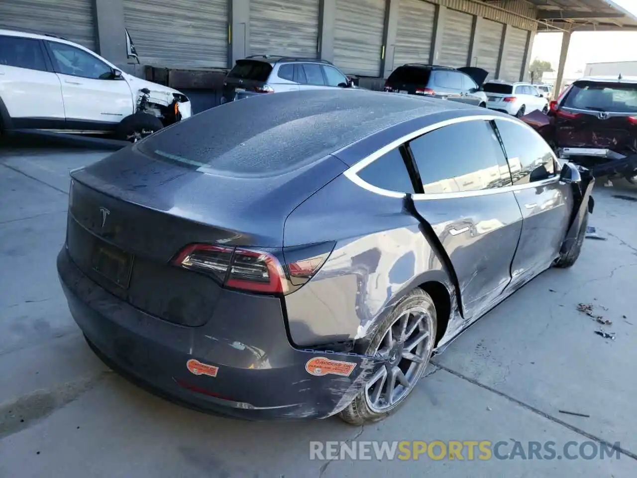 4 Photograph of a damaged car 5YJ3E1EA7LF704997 TESLA MODEL 3 2020