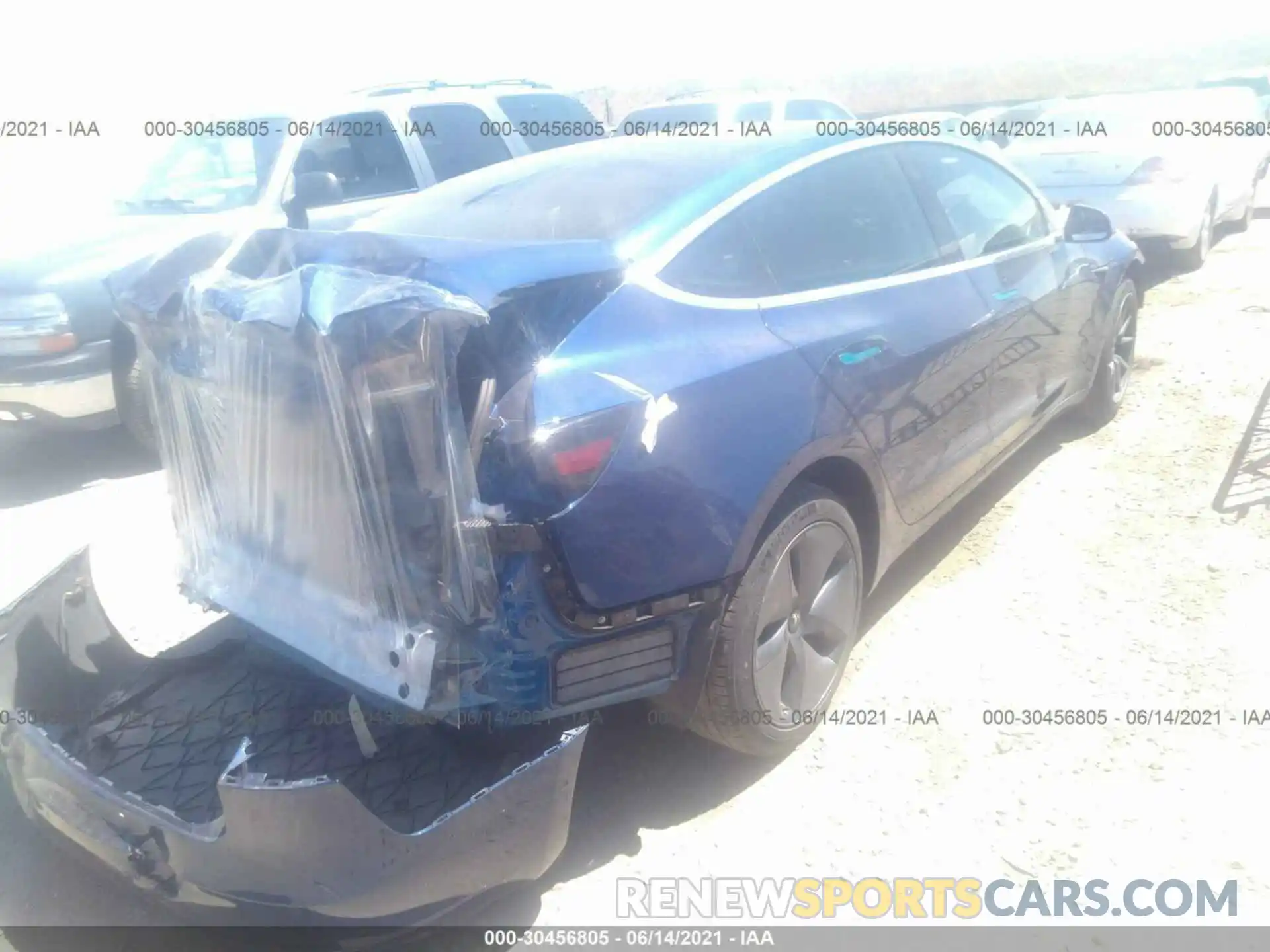 4 Photograph of a damaged car 5YJ3E1EA7LF705972 TESLA MODEL 3 2020