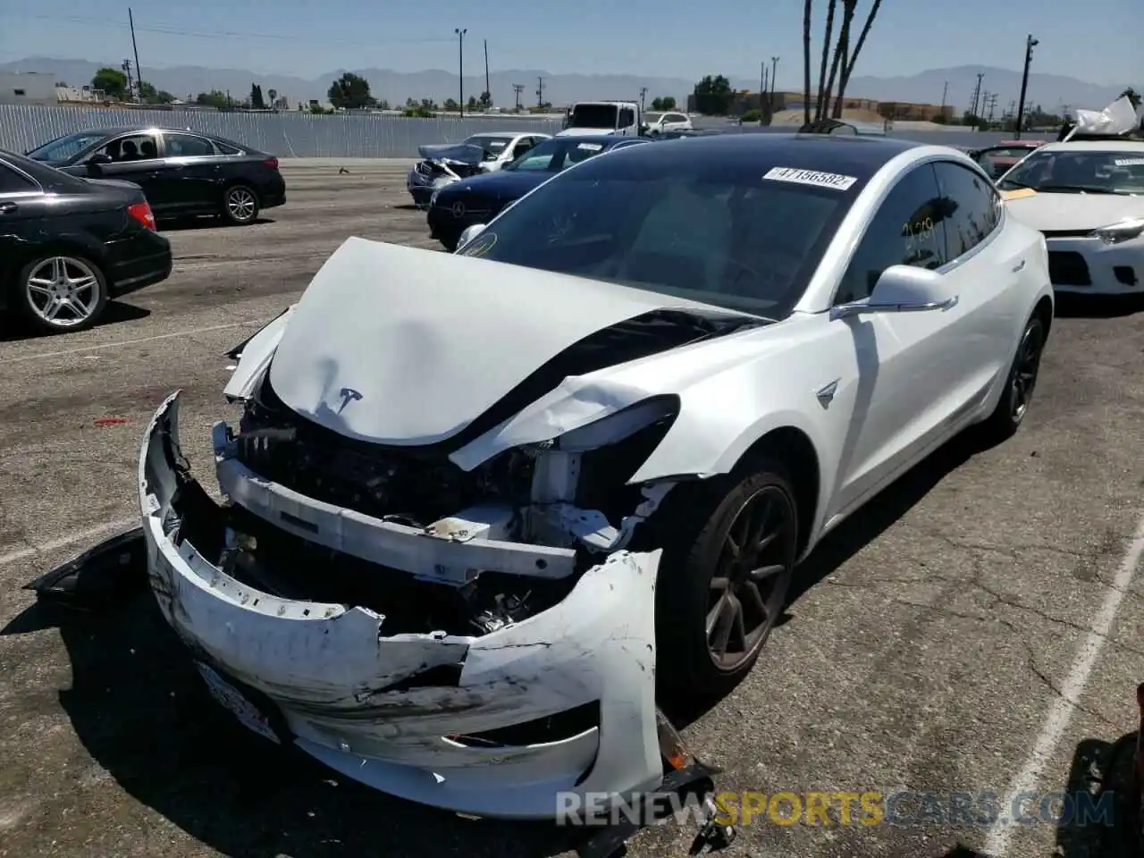 2 Photograph of a damaged car 5YJ3E1EA7LF710072 TESLA MODEL 3 2020