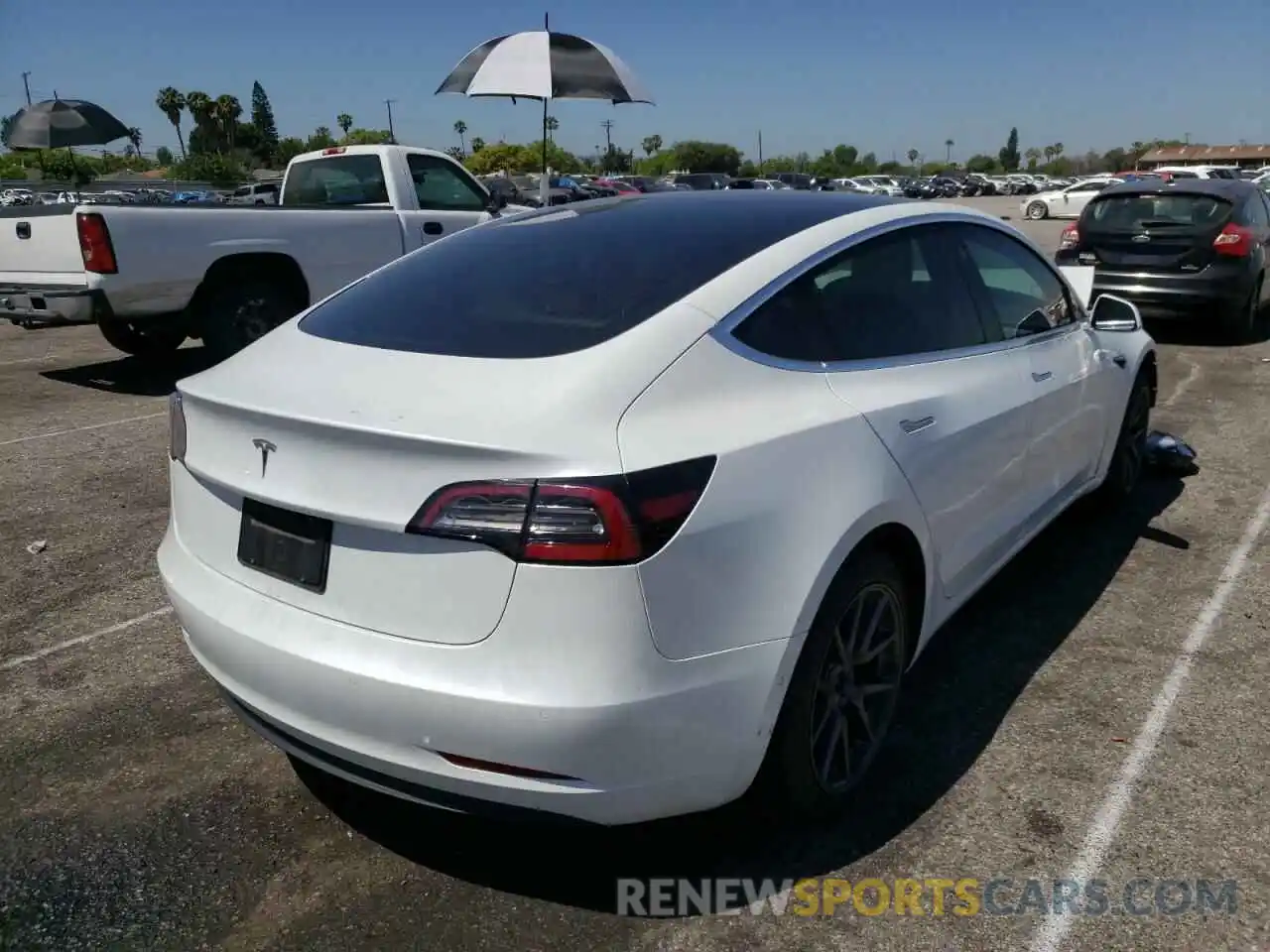 4 Photograph of a damaged car 5YJ3E1EA7LF710072 TESLA MODEL 3 2020