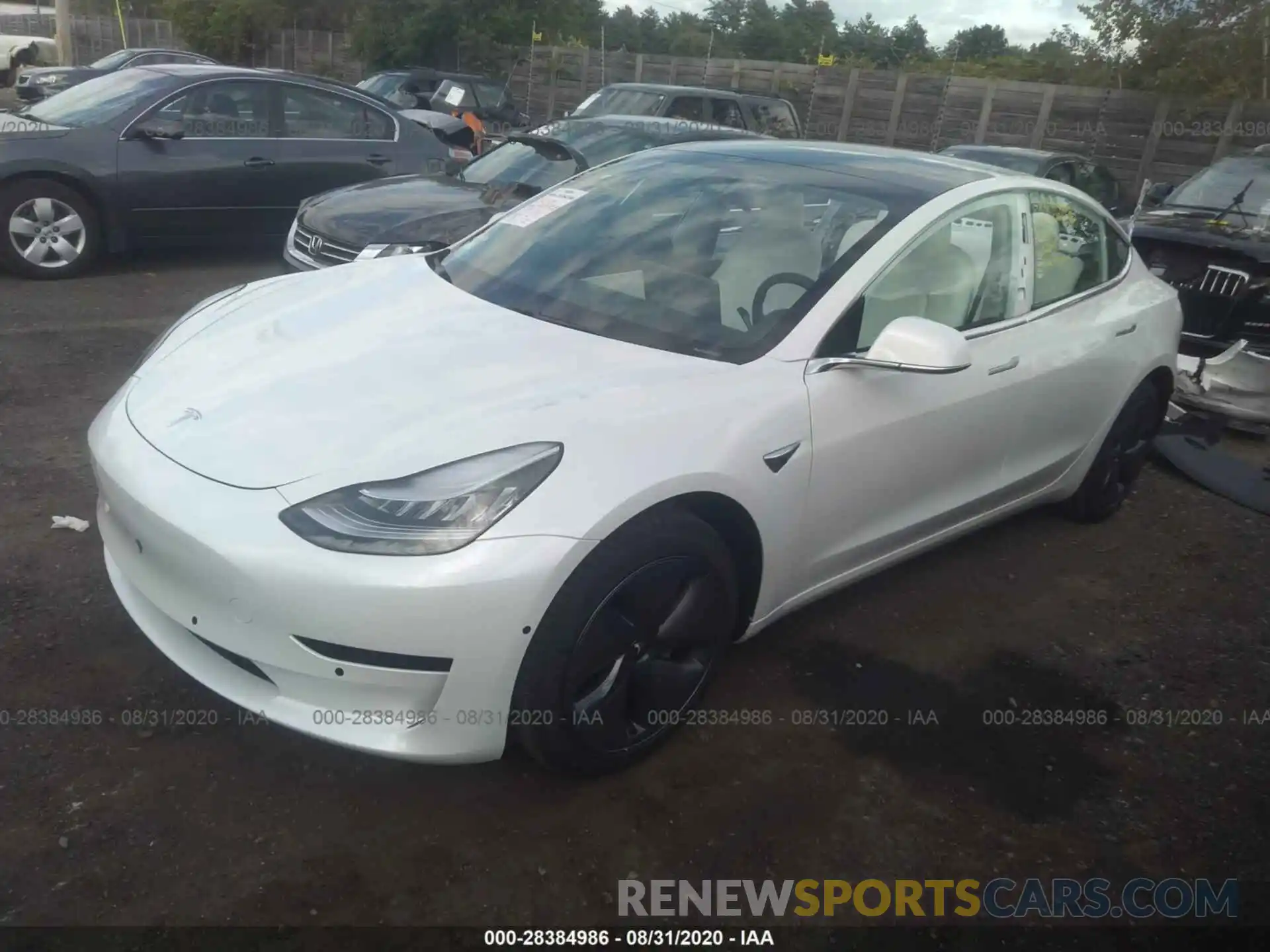 2 Photograph of a damaged car 5YJ3E1EA7LF718141 TESLA MODEL 3 2020