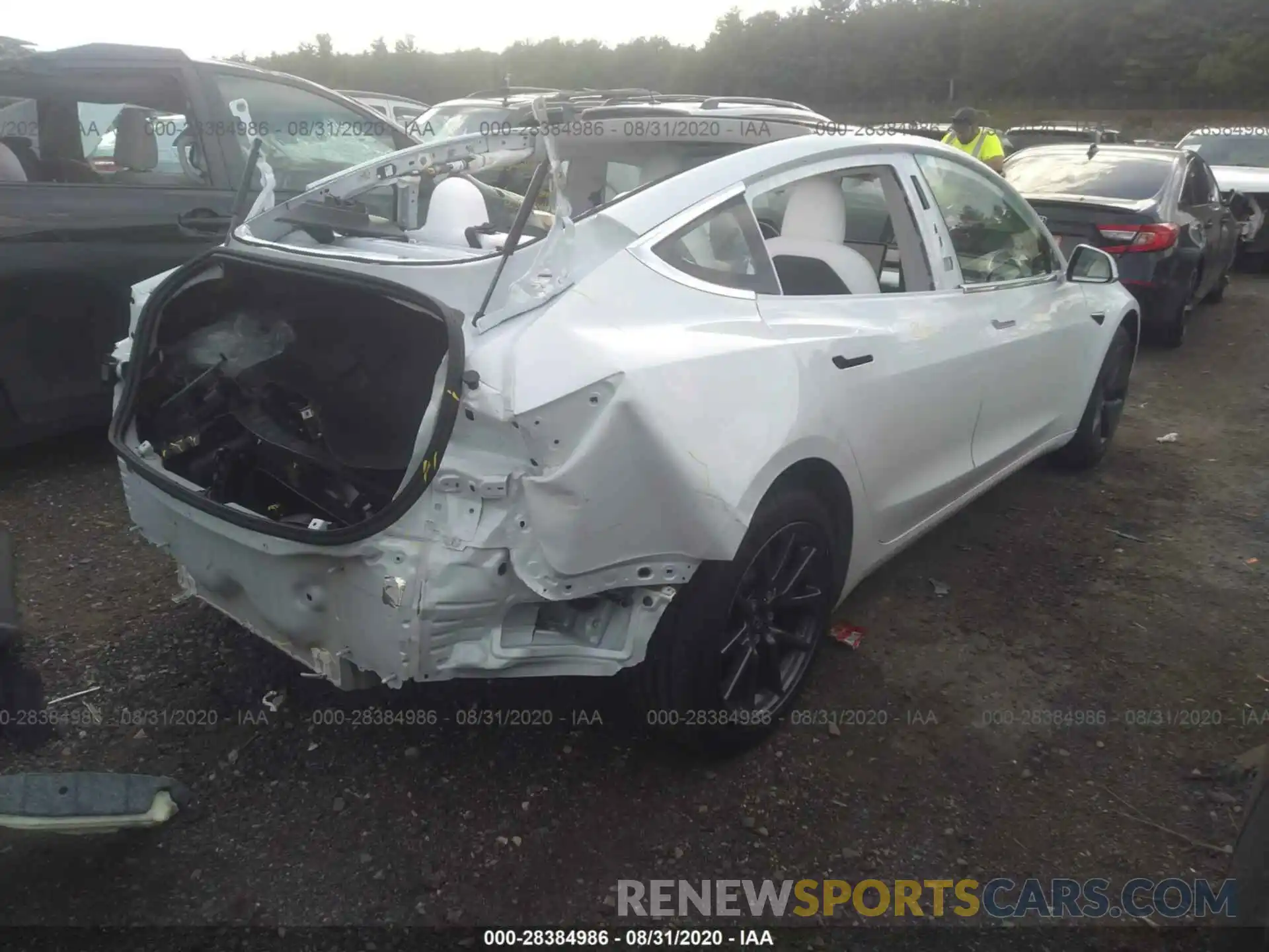 4 Photograph of a damaged car 5YJ3E1EA7LF718141 TESLA MODEL 3 2020