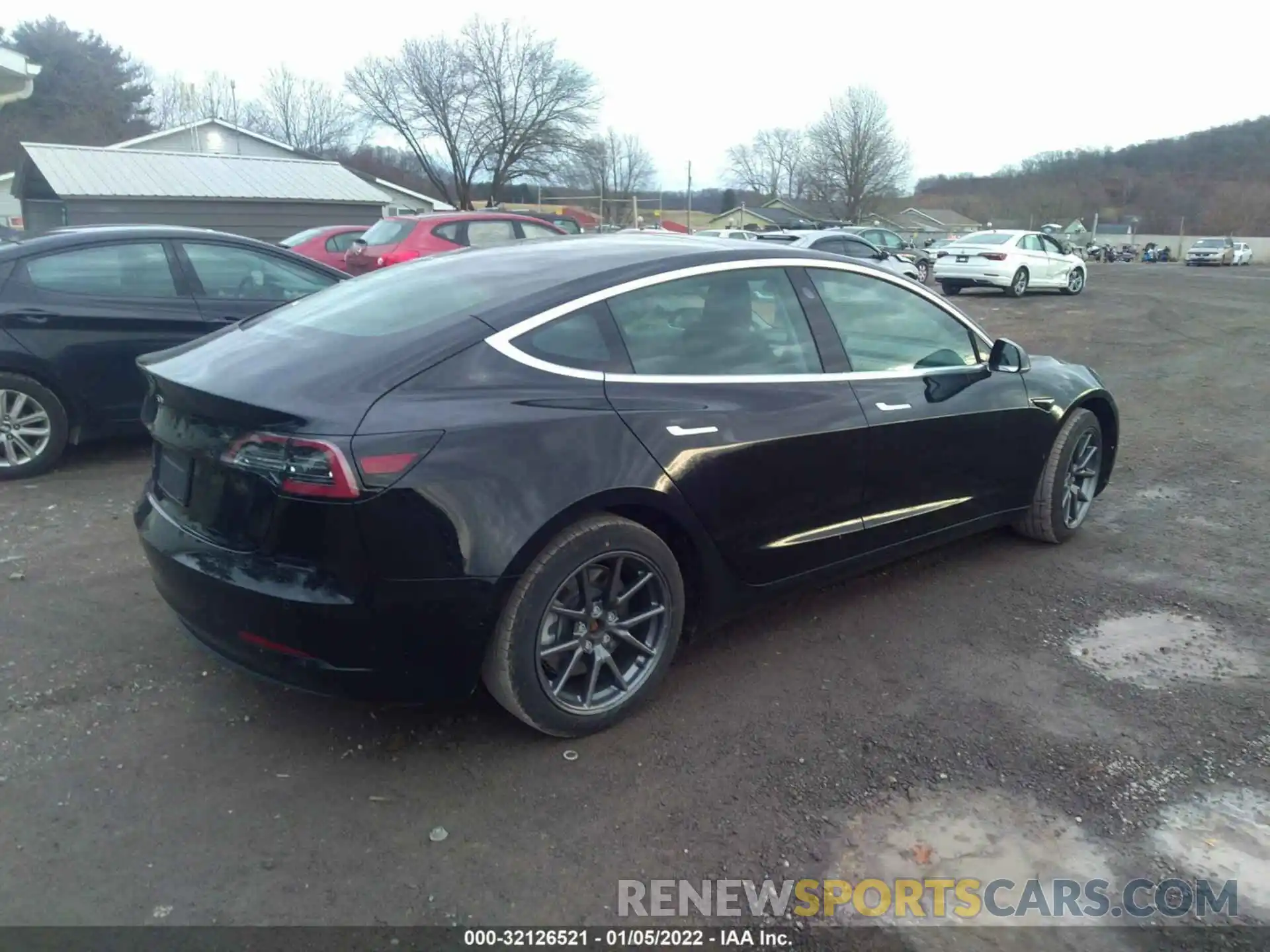 4 Photograph of a damaged car 5YJ3E1EA7LF736557 TESLA MODEL 3 2020