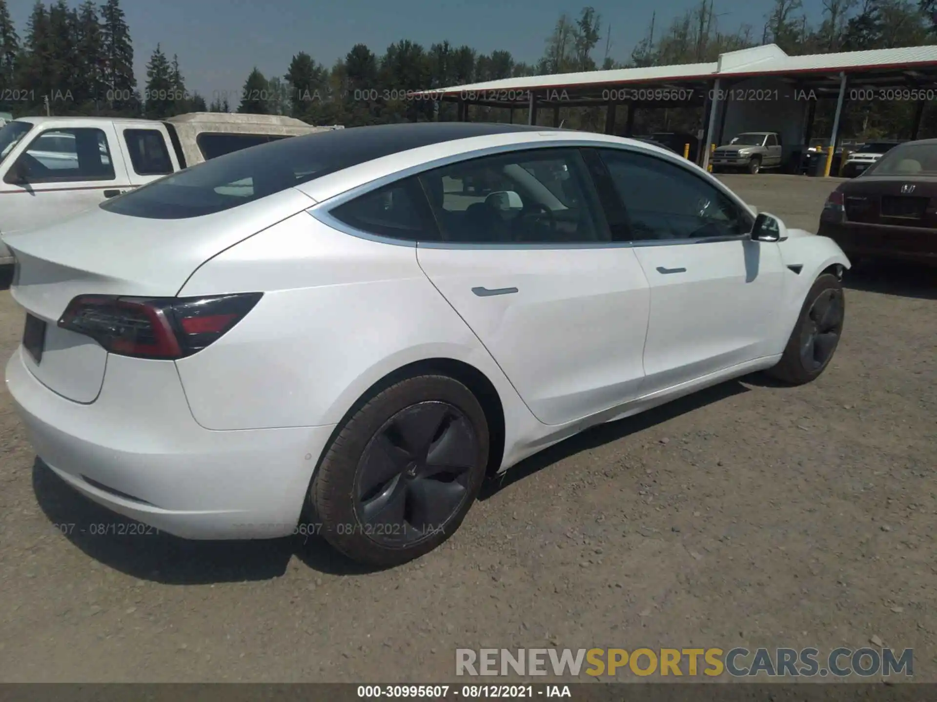 4 Photograph of a damaged car 5YJ3E1EA7LF740012 TESLA MODEL 3 2020