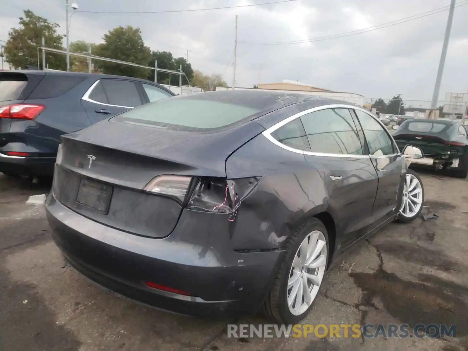 4 Photograph of a damaged car 5YJ3E1EA7LF783765 TESLA MODEL 3 2020