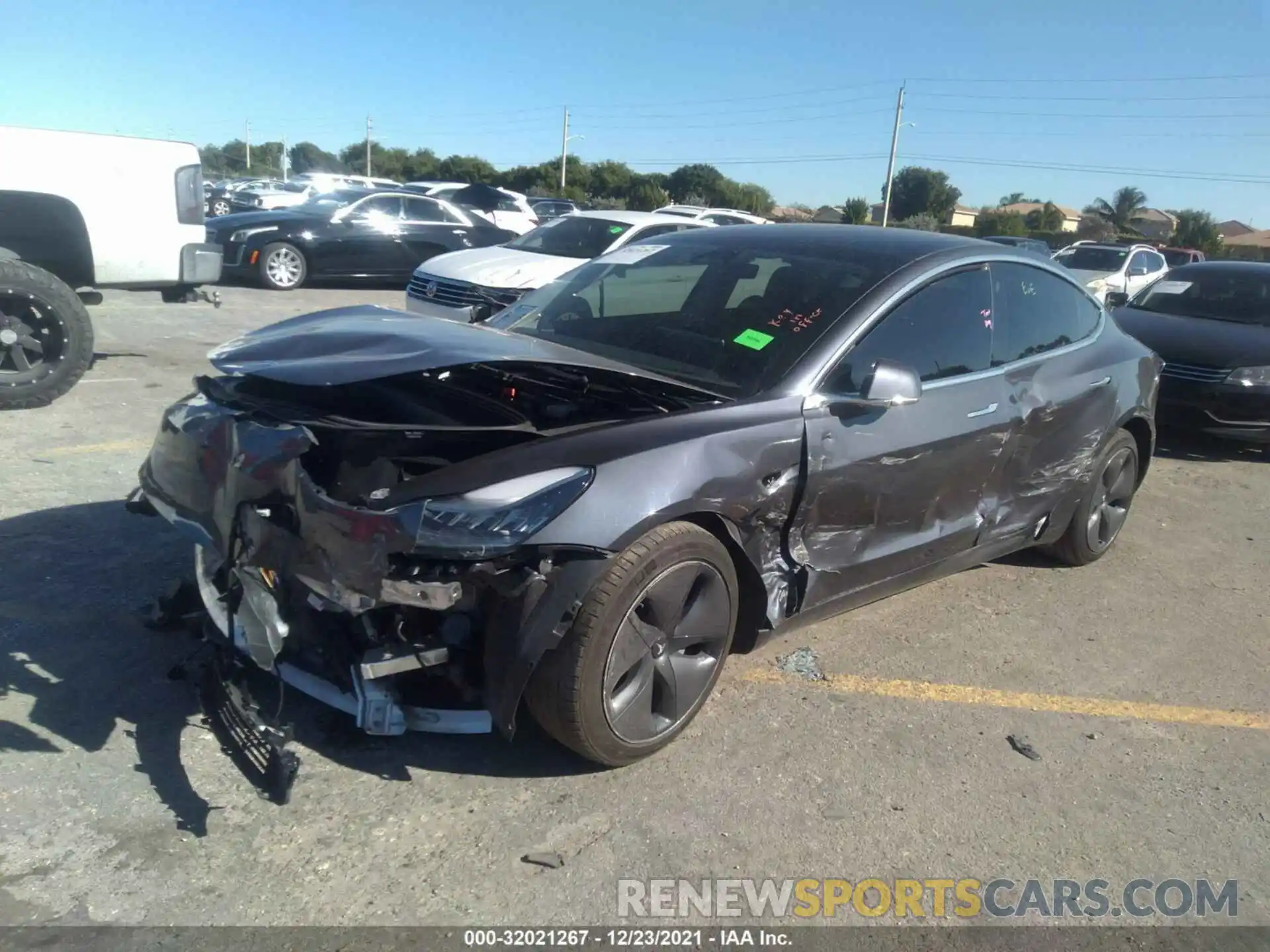 2 Photograph of a damaged car 5YJ3E1EA7LF784852 TESLA MODEL 3 2020