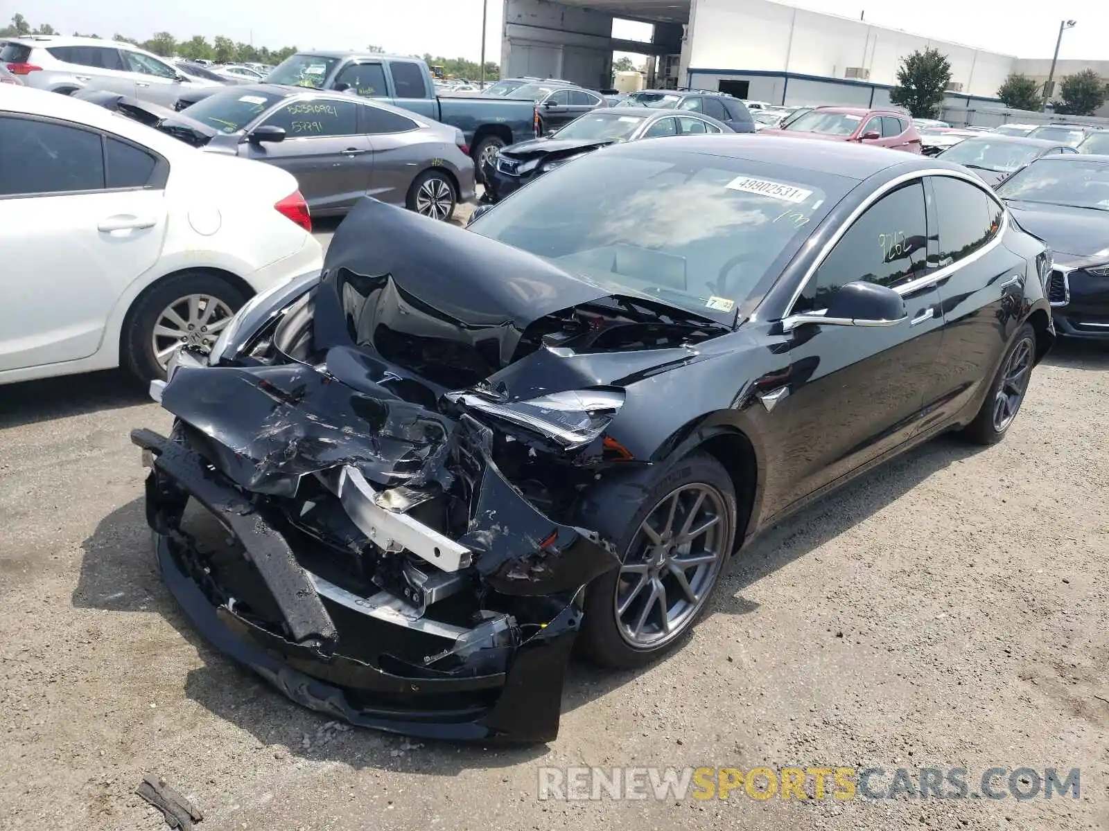 2 Photograph of a damaged car 5YJ3E1EA7LF793129 TESLA MODEL 3 2020