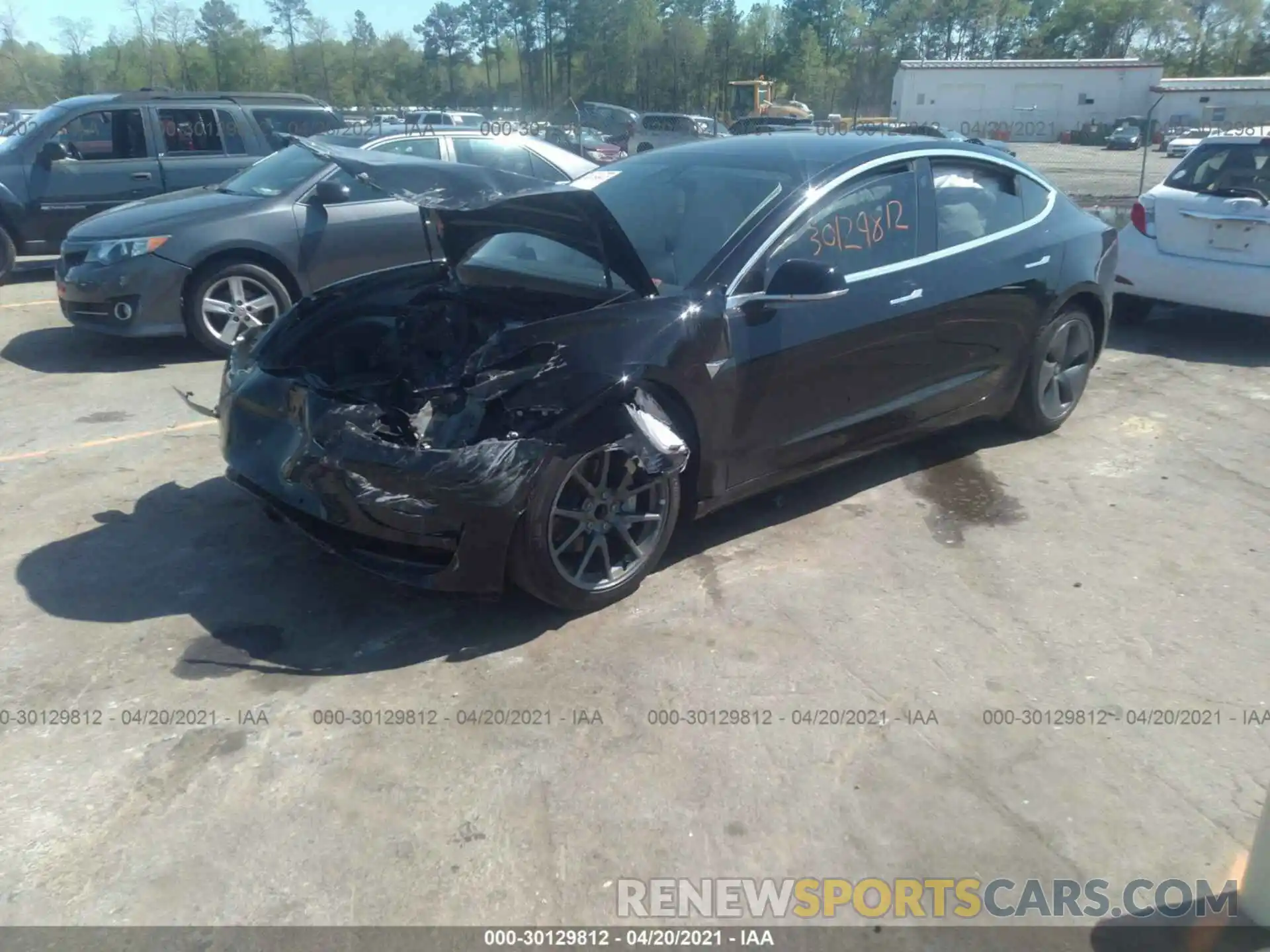 2 Photograph of a damaged car 5YJ3E1EA7LF797648 TESLA MODEL 3 2020