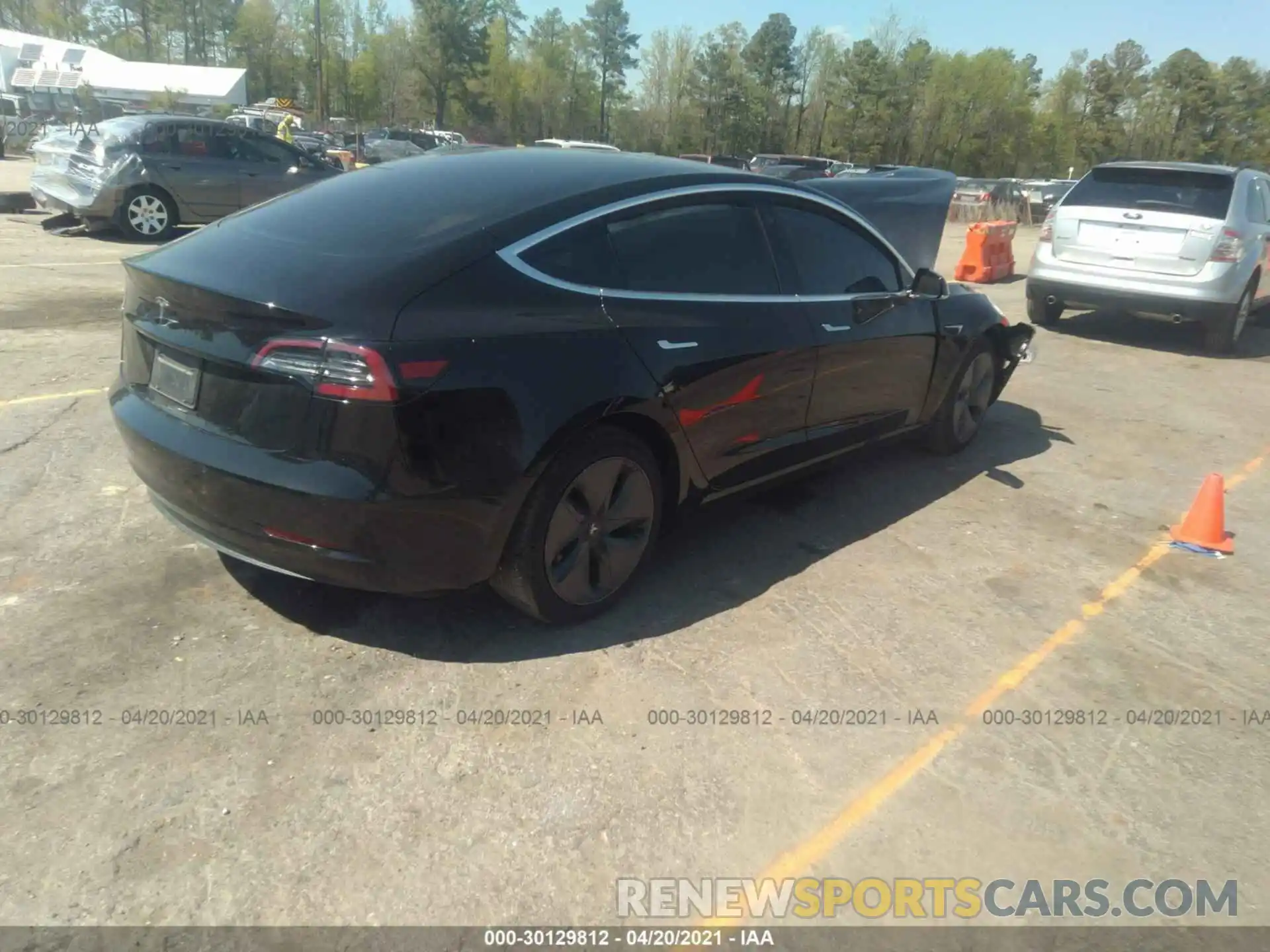 4 Photograph of a damaged car 5YJ3E1EA7LF797648 TESLA MODEL 3 2020