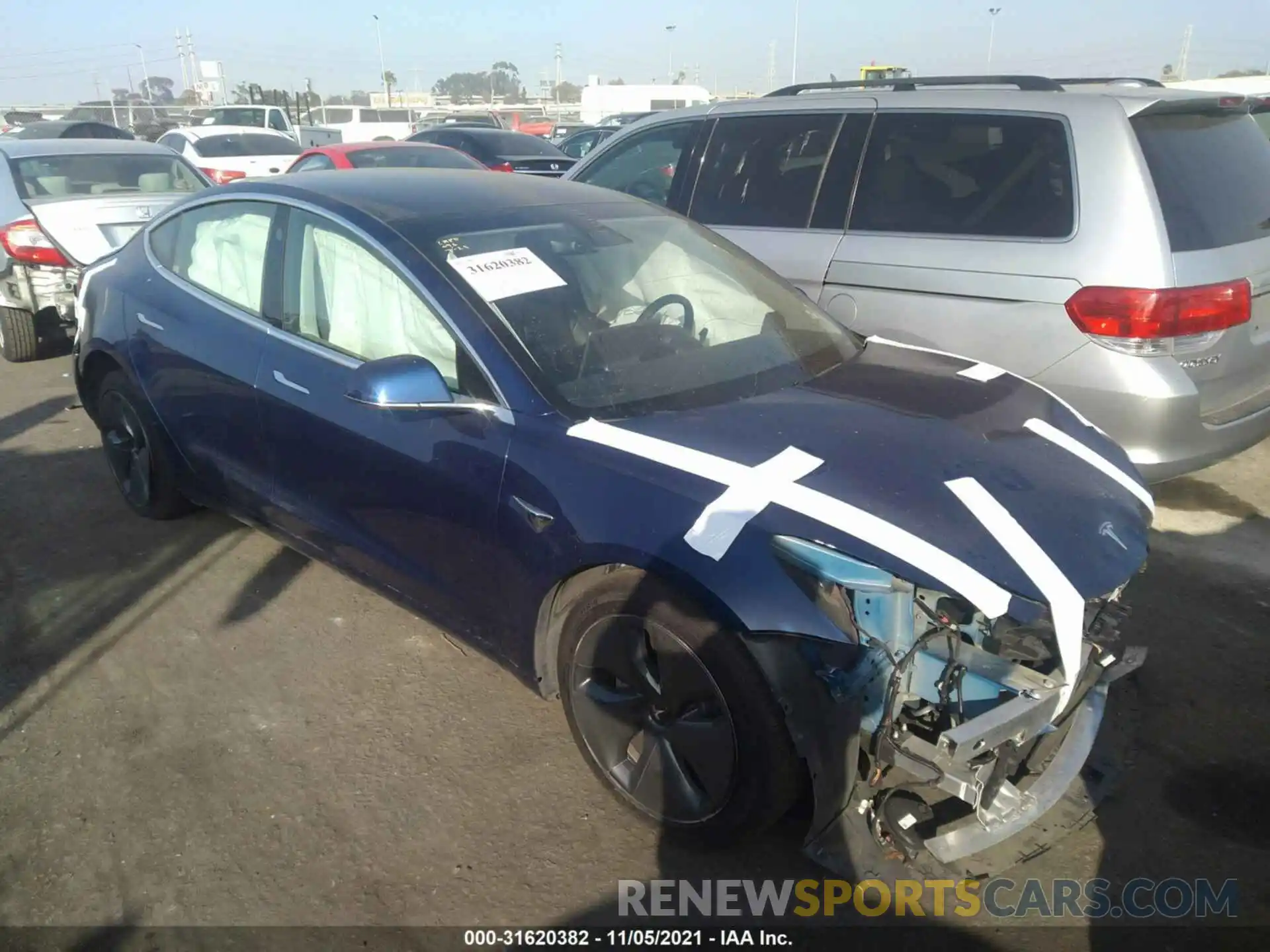 1 Photograph of a damaged car 5YJ3E1EA7LF803755 TESLA MODEL 3 2020