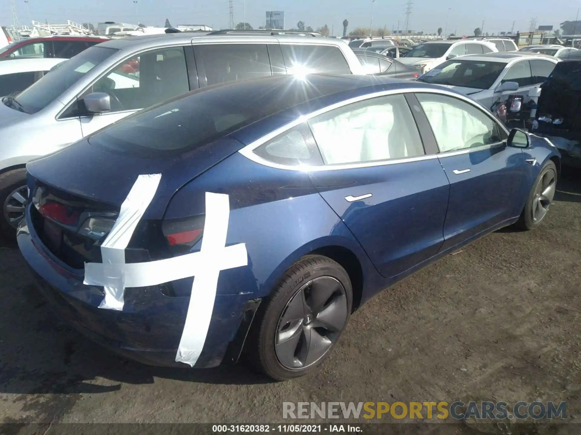 4 Photograph of a damaged car 5YJ3E1EA7LF803755 TESLA MODEL 3 2020