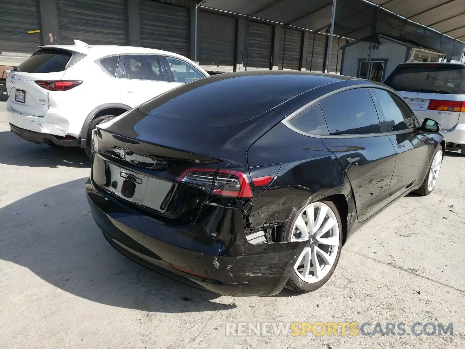 4 Photograph of a damaged car 5YJ3E1EA7LF807885 TESLA MODEL 3 2020