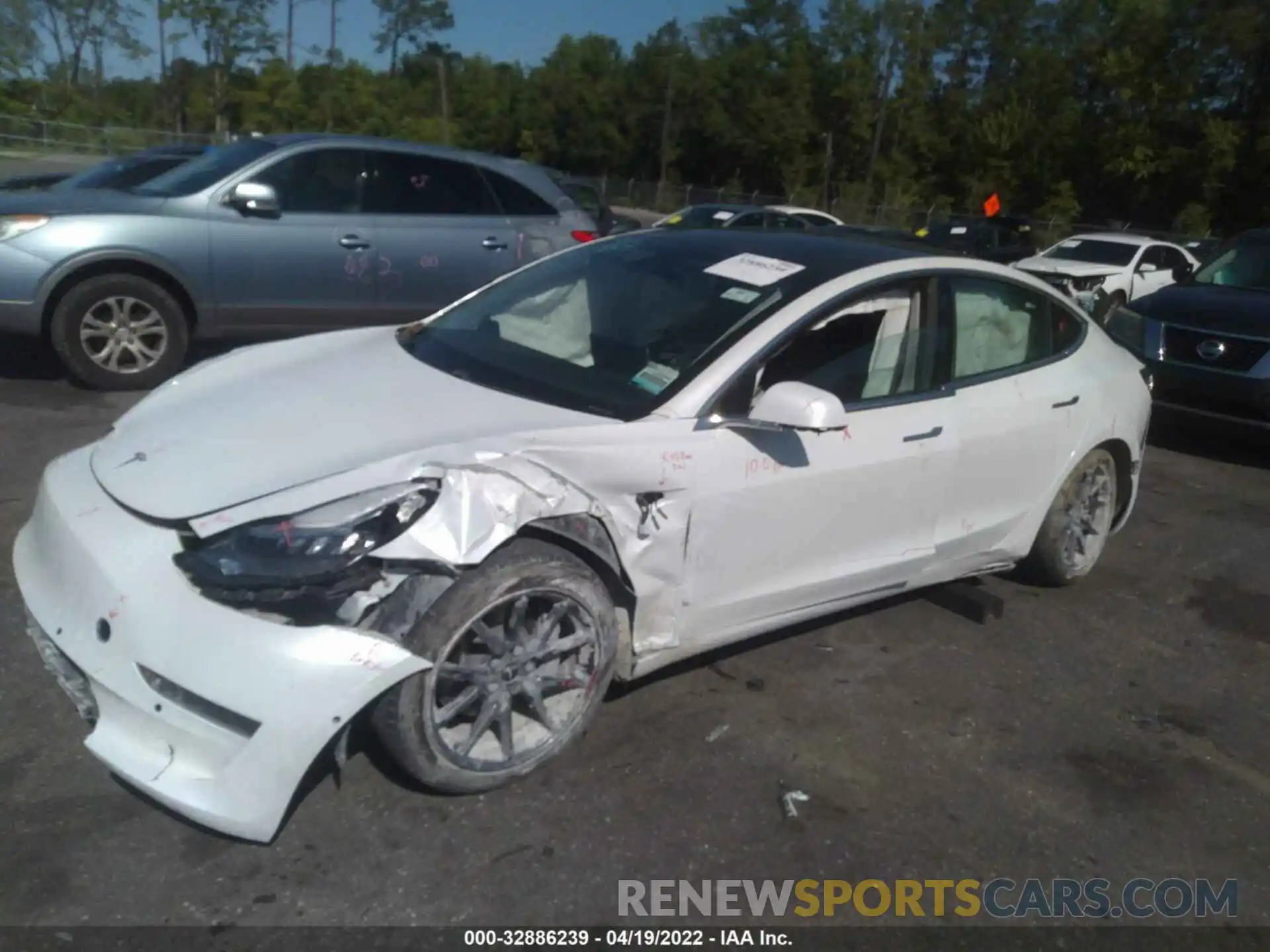 2 Photograph of a damaged car 5YJ3E1EA8LF504209 TESLA MODEL 3 2020