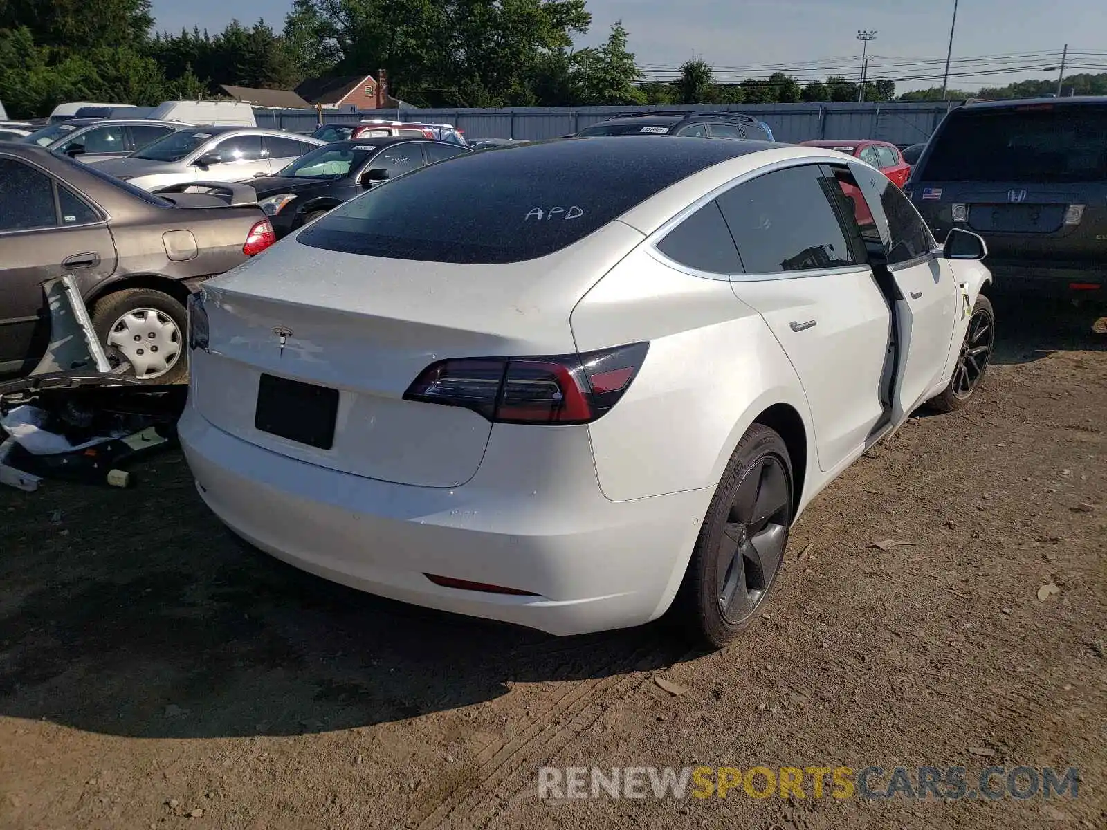 4 Photograph of a damaged car 5YJ3E1EA8LF590461 TESLA MODEL 3 2020