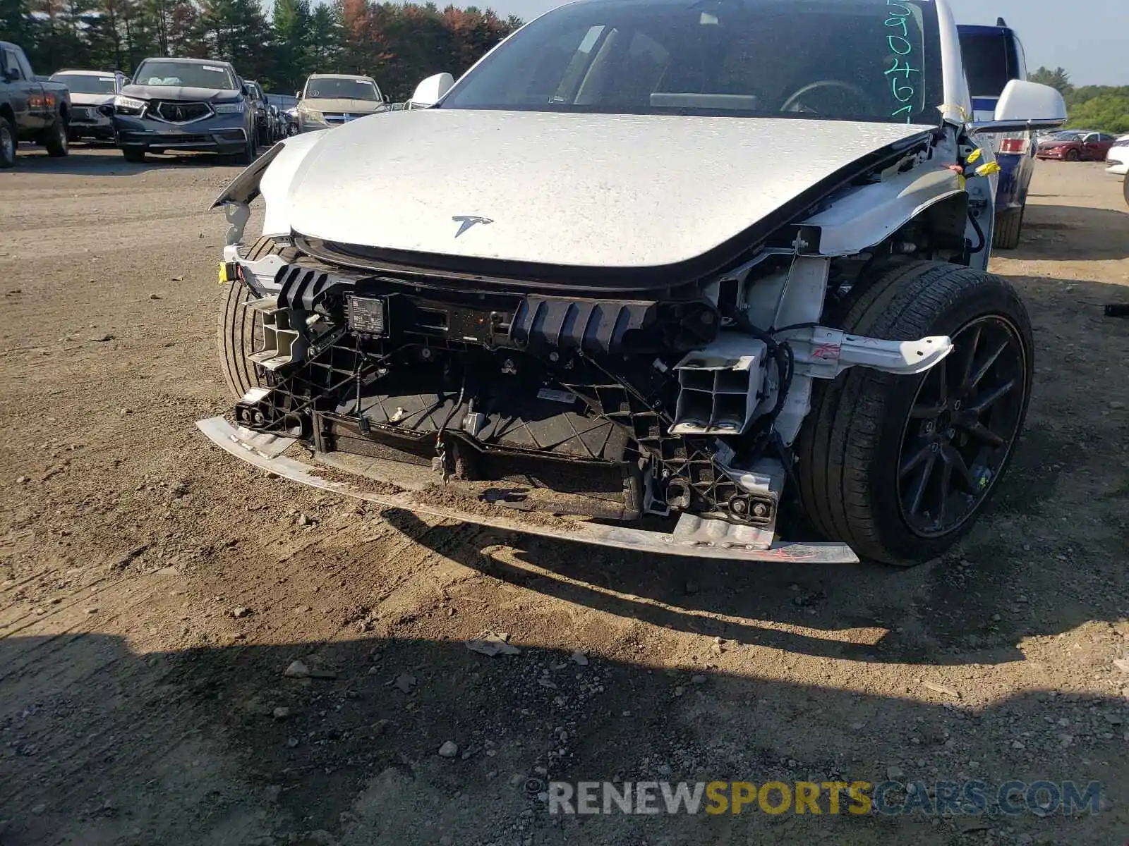 9 Photograph of a damaged car 5YJ3E1EA8LF590461 TESLA MODEL 3 2020