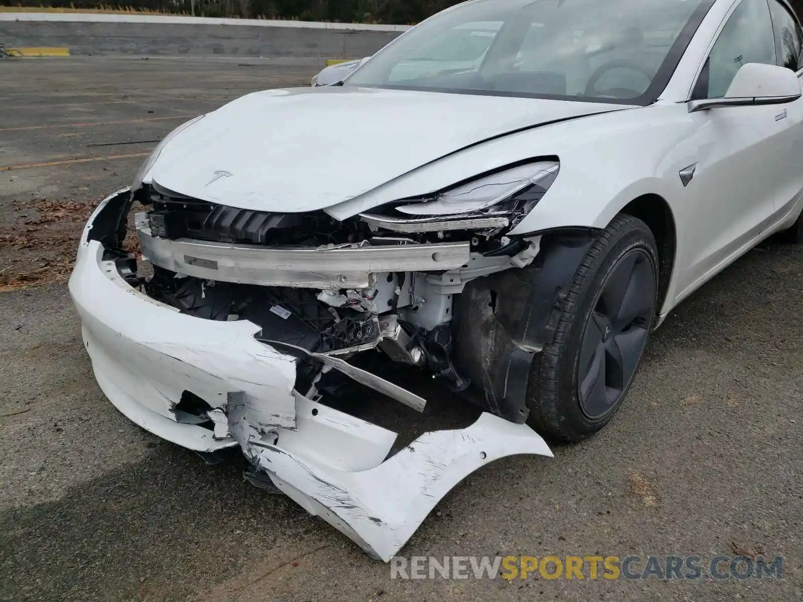 9 Photograph of a damaged car 5YJ3E1EA8LF591089 TESLA MODEL 3 2020