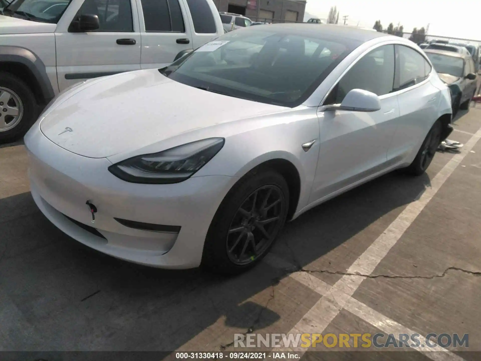 2 Photograph of a damaged car 5YJ3E1EA8LF597412 TESLA MODEL 3 2020