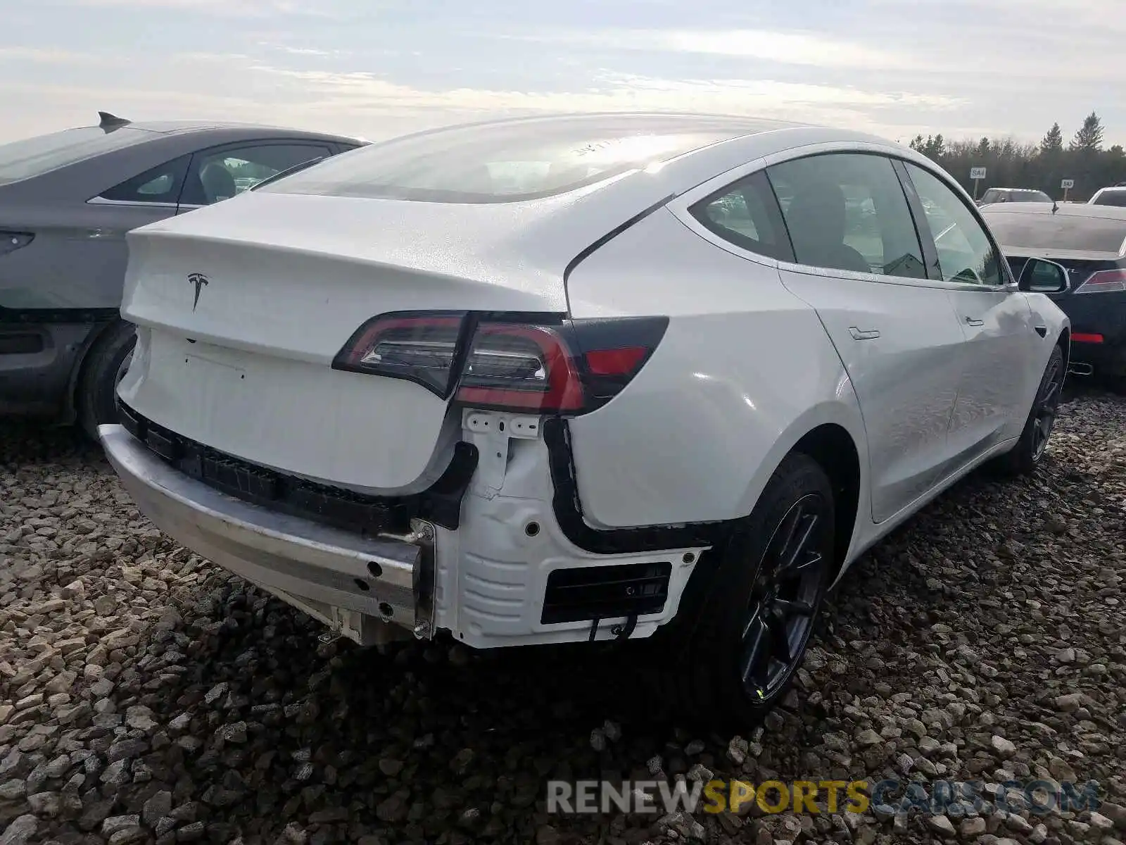 4 Photograph of a damaged car 5YJ3E1EA8LF603810 TESLA MODEL 3 2020