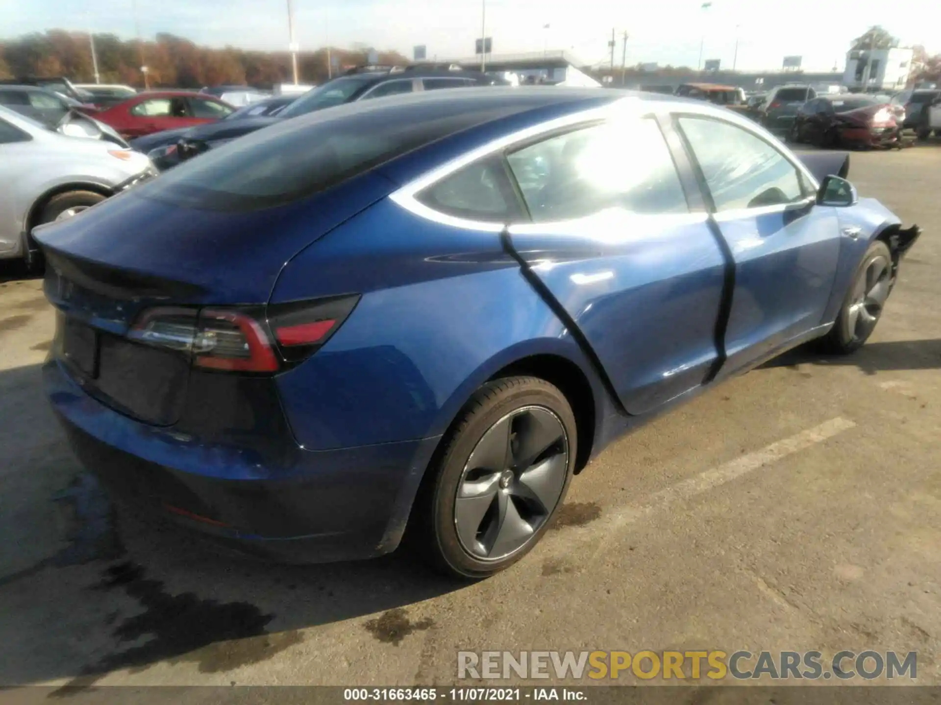 4 Photograph of a damaged car 5YJ3E1EA8LF631056 TESLA MODEL 3 2020