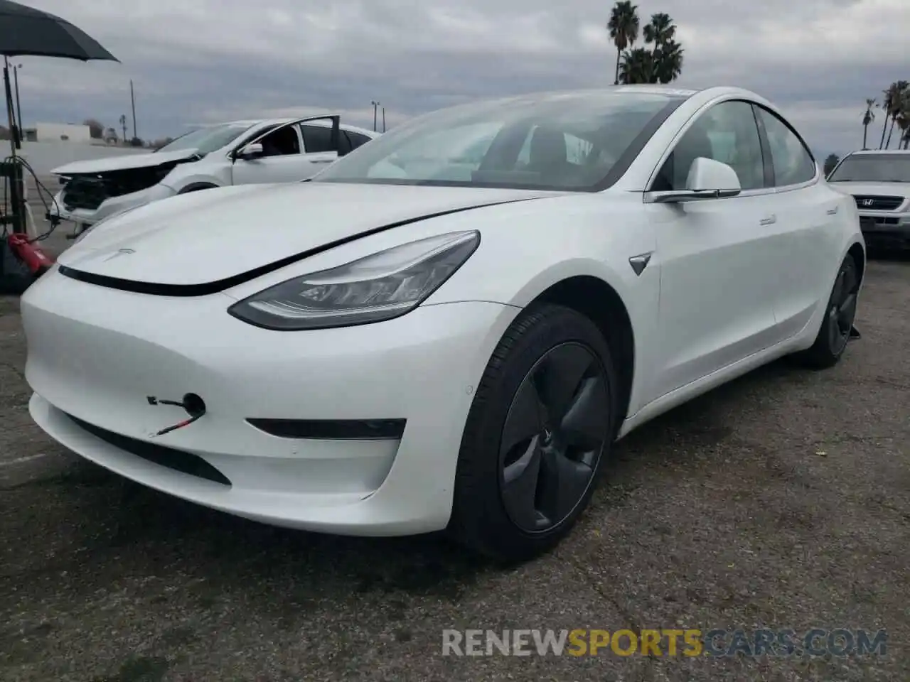 2 Photograph of a damaged car 5YJ3E1EA8LF631588 TESLA MODEL 3 2020