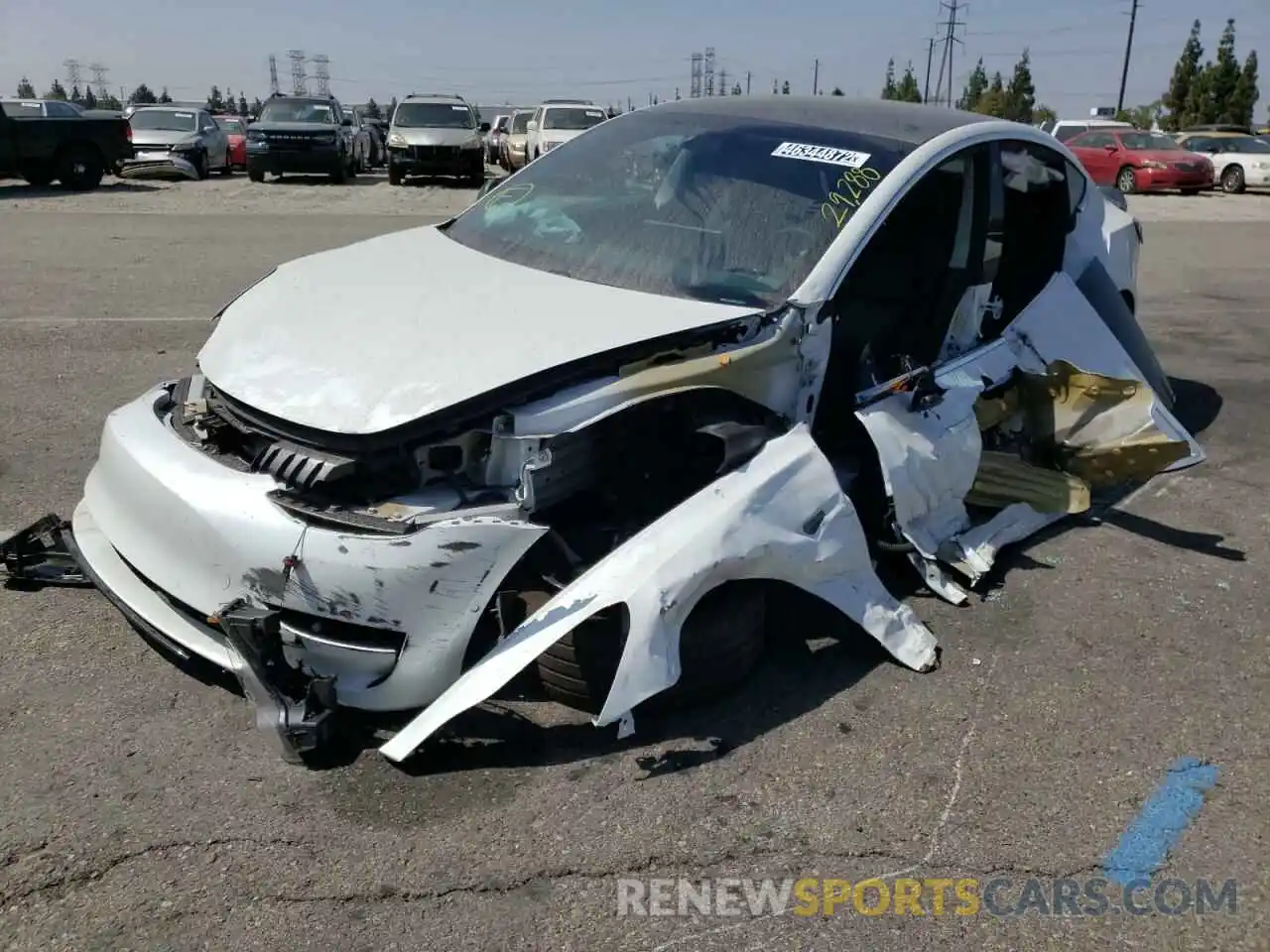 2 Photograph of a damaged car 5YJ3E1EA8LF631817 TESLA MODEL 3 2020