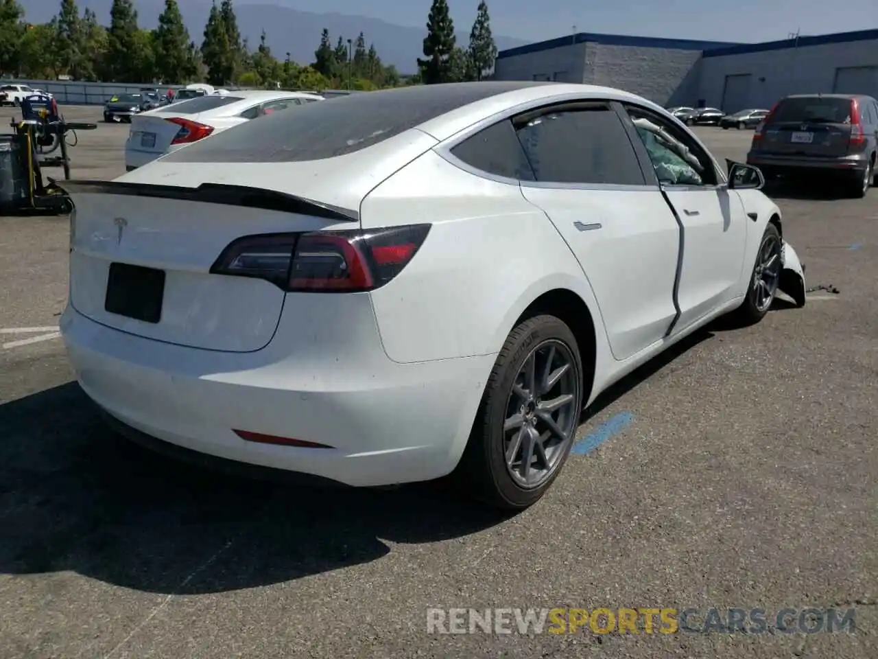 4 Photograph of a damaged car 5YJ3E1EA8LF631817 TESLA MODEL 3 2020