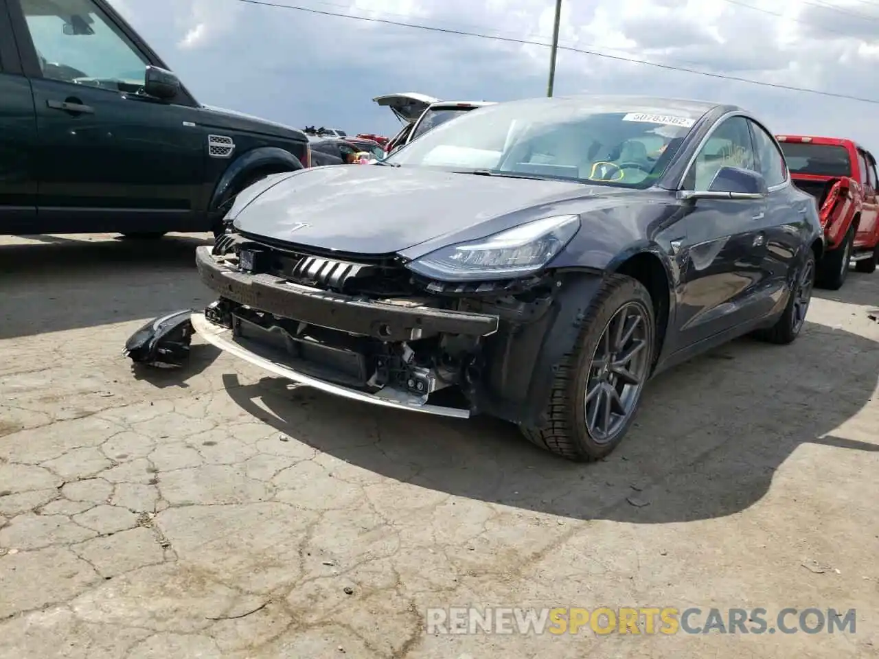 2 Photograph of a damaged car 5YJ3E1EA8LF645913 TESLA MODEL 3 2020