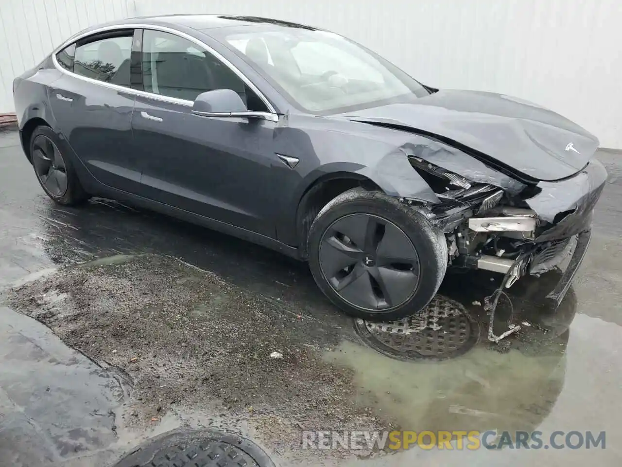 4 Photograph of a damaged car 5YJ3E1EA8LF657754 TESLA MODEL 3 2020