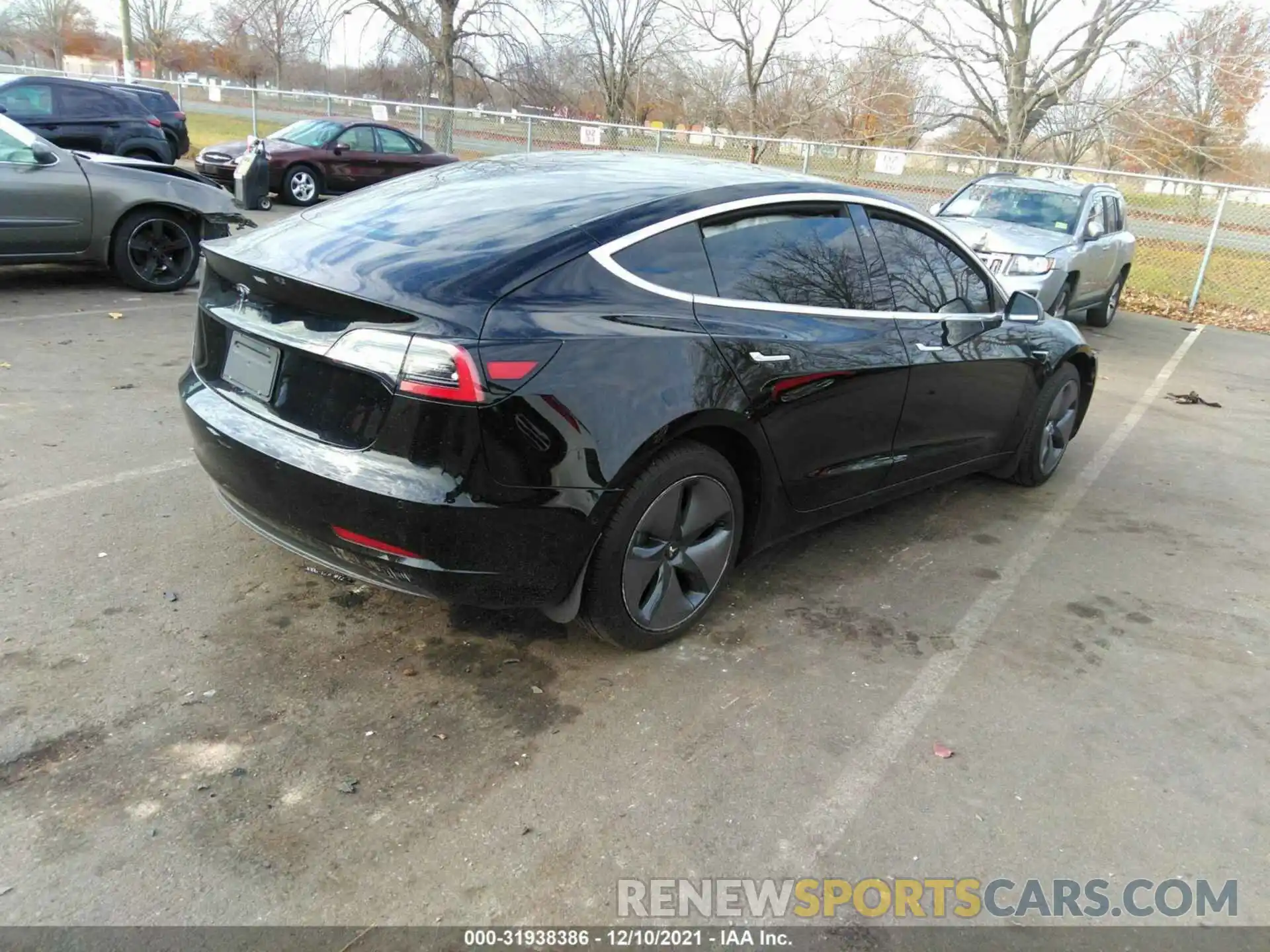 4 Photograph of a damaged car 5YJ3E1EA8LF715135 TESLA MODEL 3 2020