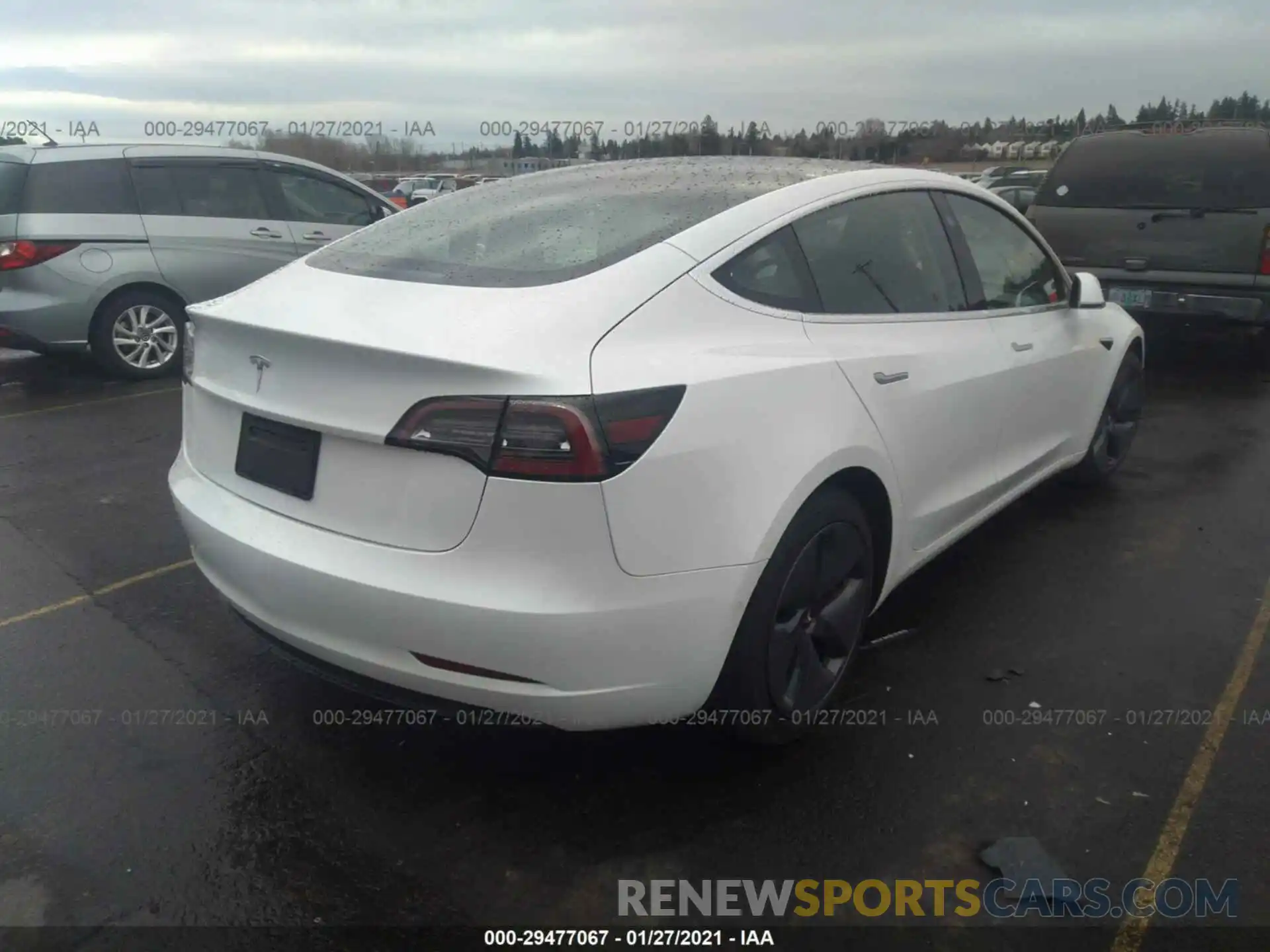 4 Photograph of a damaged car 5YJ3E1EA8LF740312 TESLA MODEL 3 2020