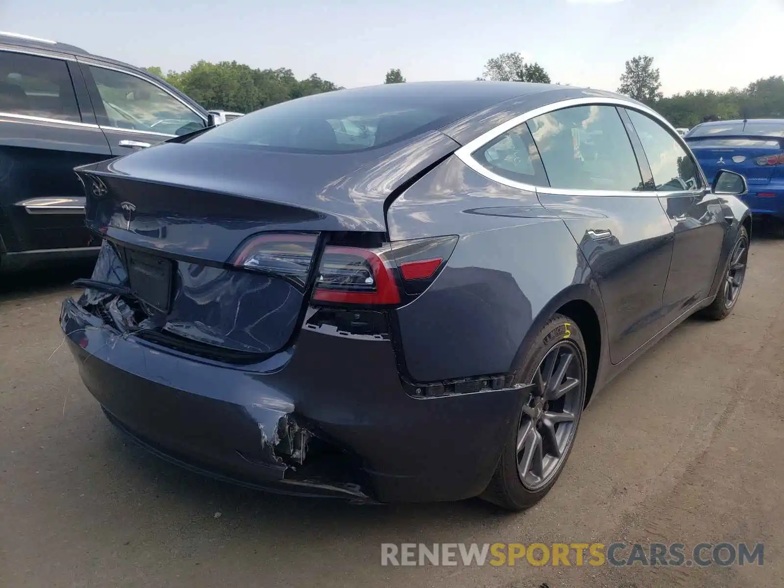 4 Photograph of a damaged car 5YJ3E1EA8LF784813 TESLA MODEL 3 2020