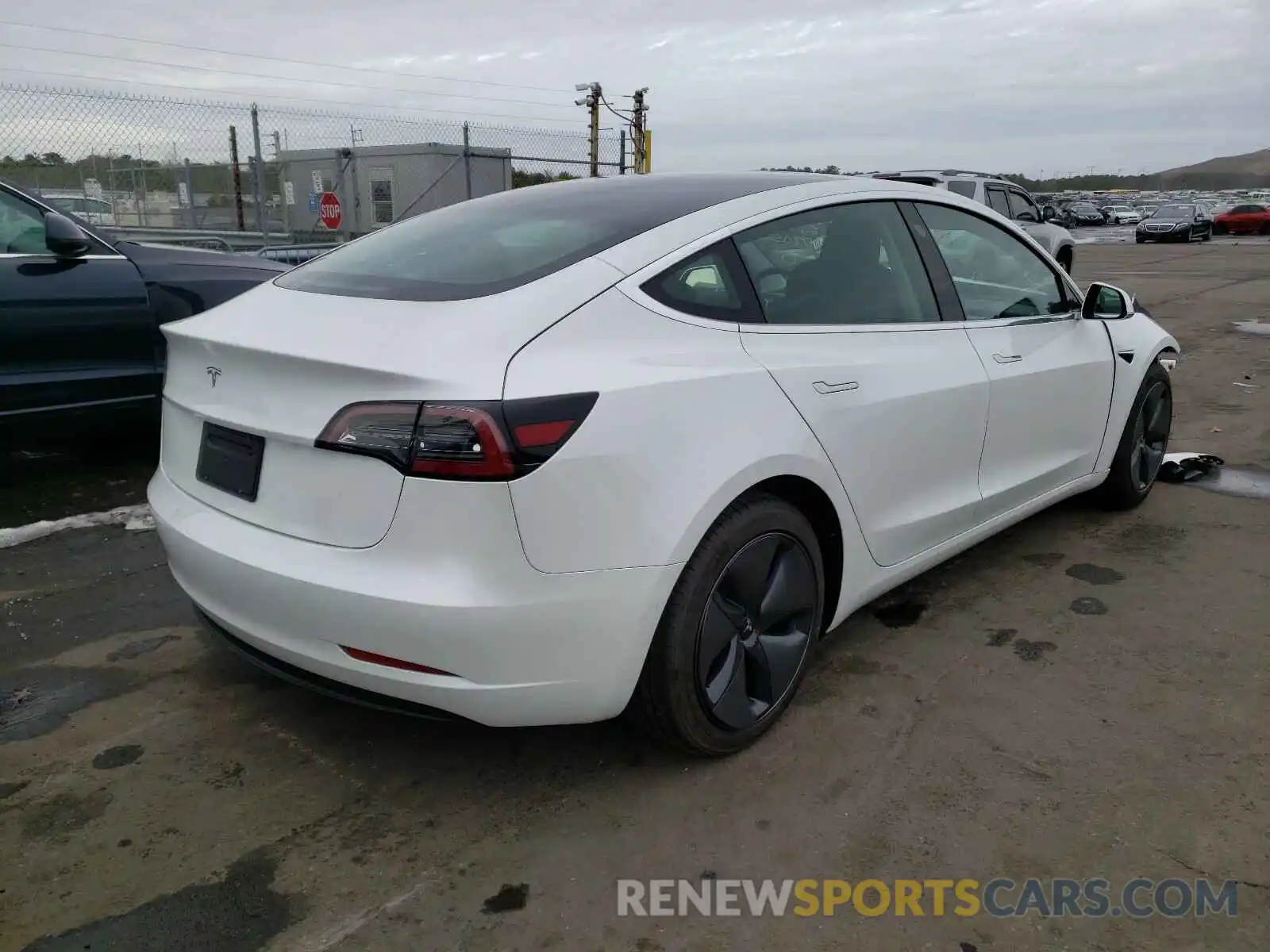 4 Photograph of a damaged car 5YJ3E1EA8LF797156 TESLA MODEL 3 2020