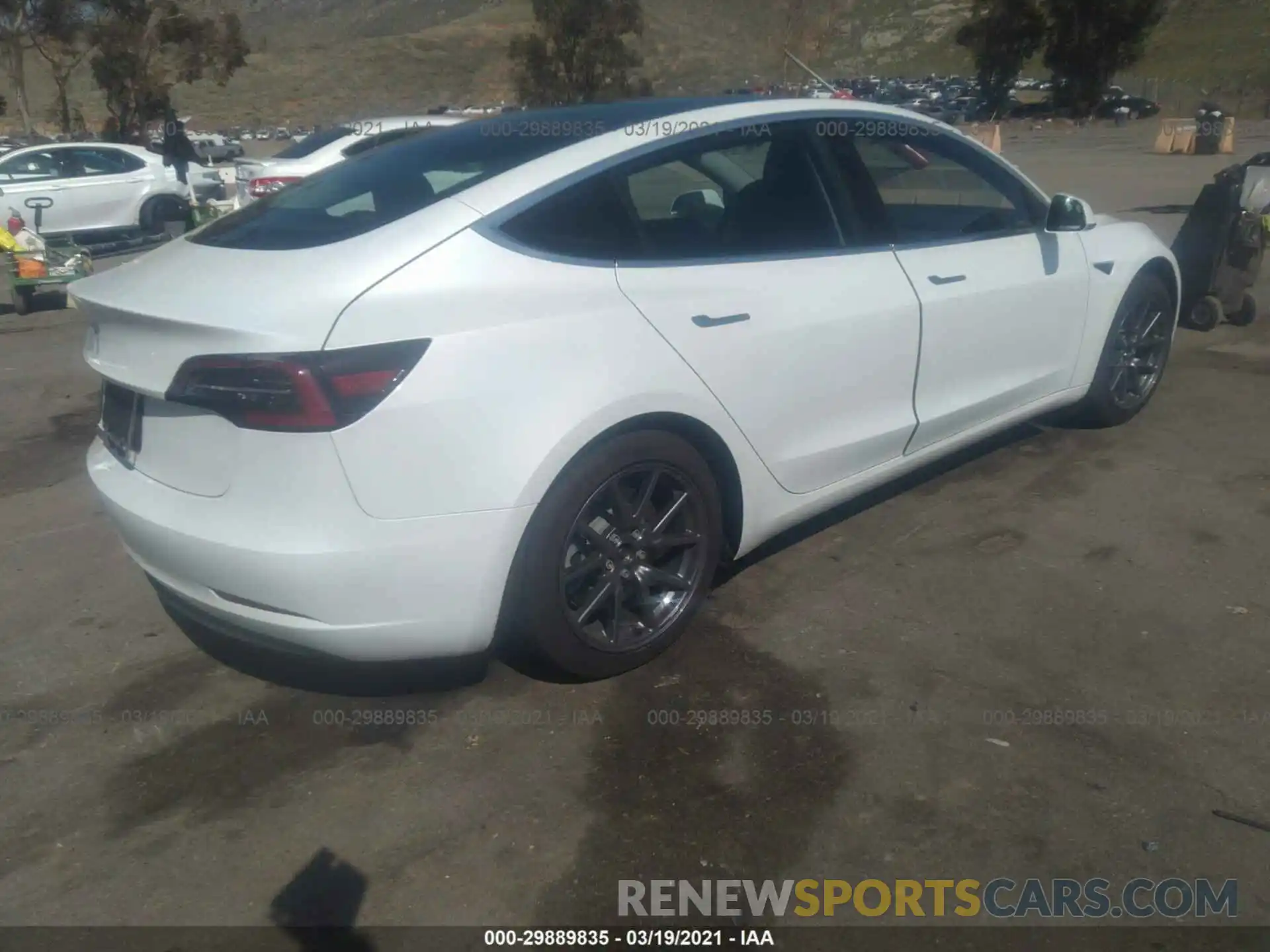 4 Photograph of a damaged car 5YJ3E1EA8LF799974 TESLA MODEL 3 2020