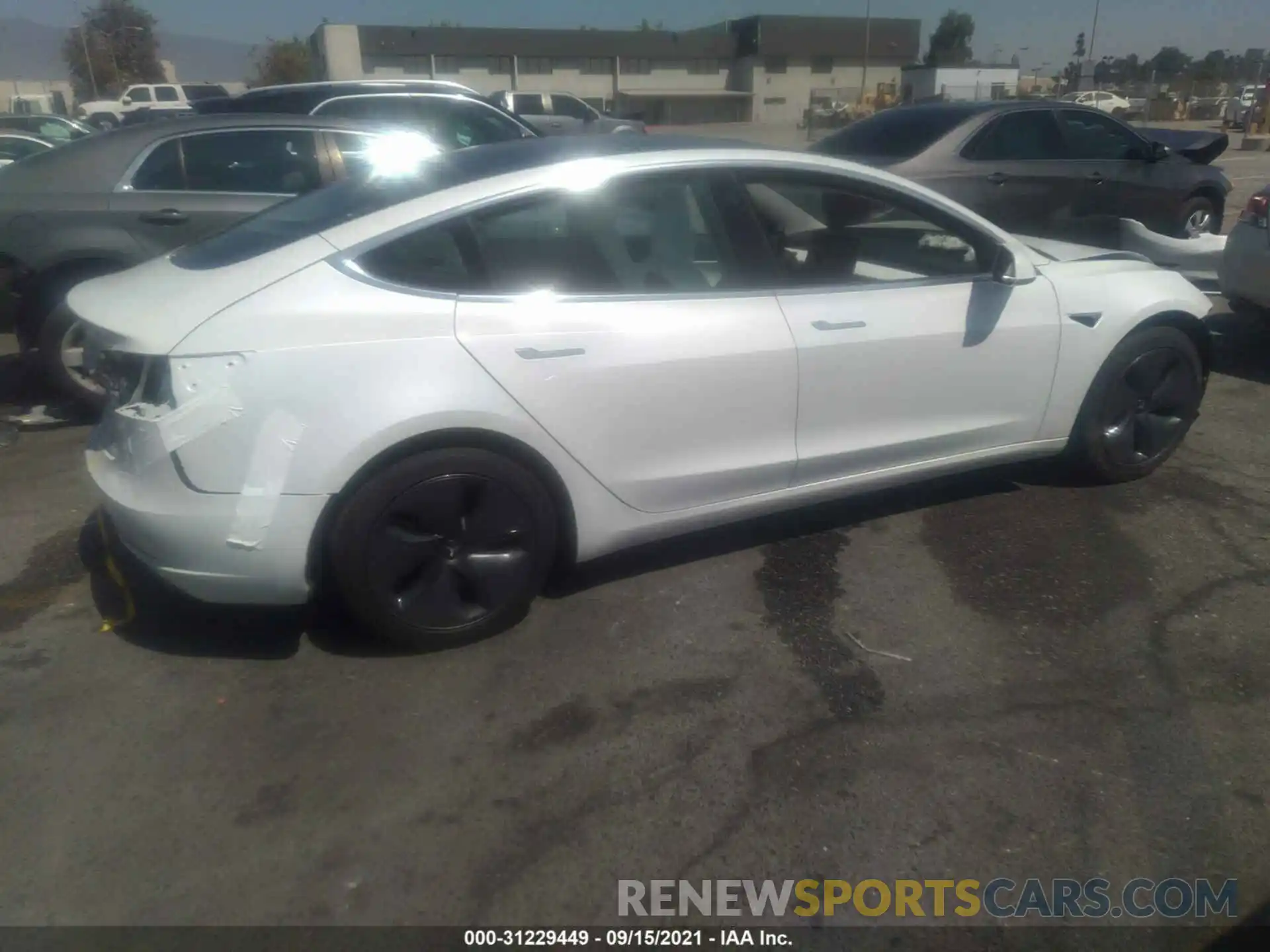 4 Photograph of a damaged car 5YJ3E1EA8LF805112 TESLA MODEL 3 2020