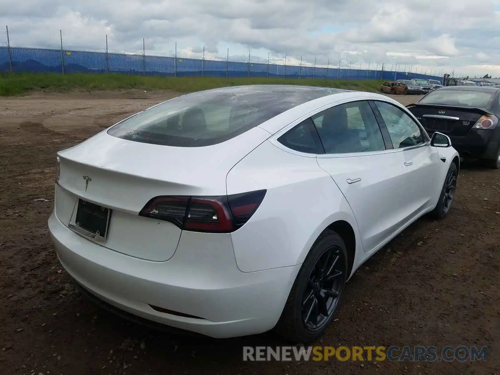 4 Photograph of a damaged car 5YJ3E1EA9LF529457 TESLA MODEL 3 2020