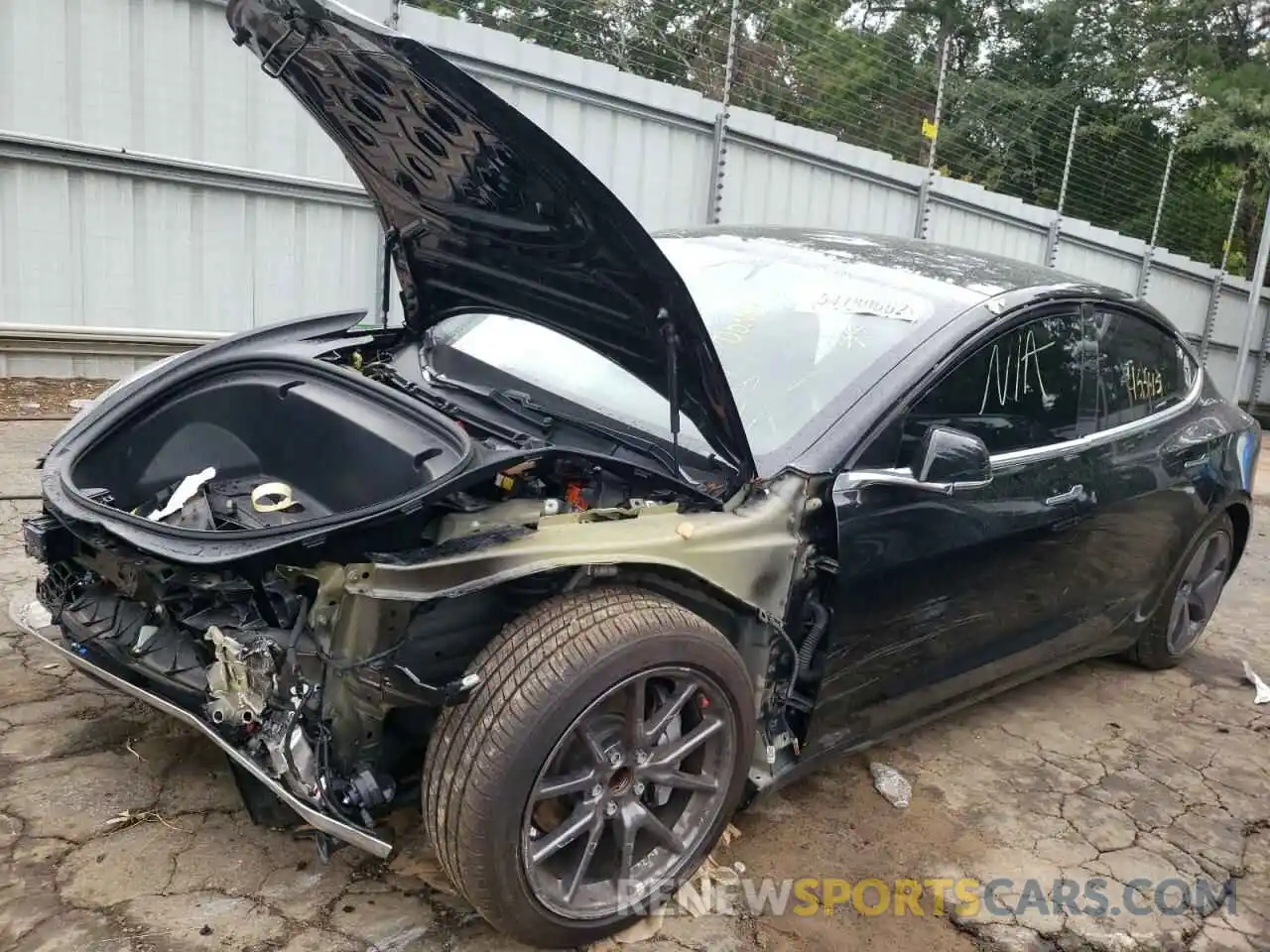 2 Photograph of a damaged car 5YJ3E1EA9LF590243 TESLA MODEL 3 2020