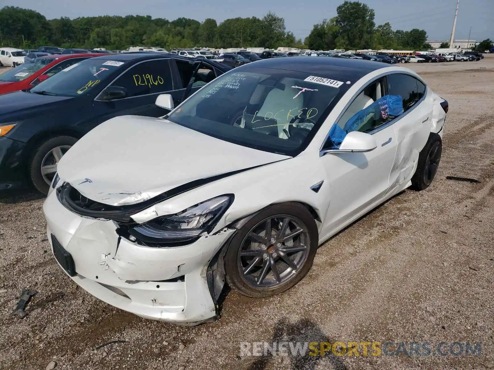 2 Photograph of a damaged car 5YJ3E1EA9LF599007 TESLA MODEL 3 2020