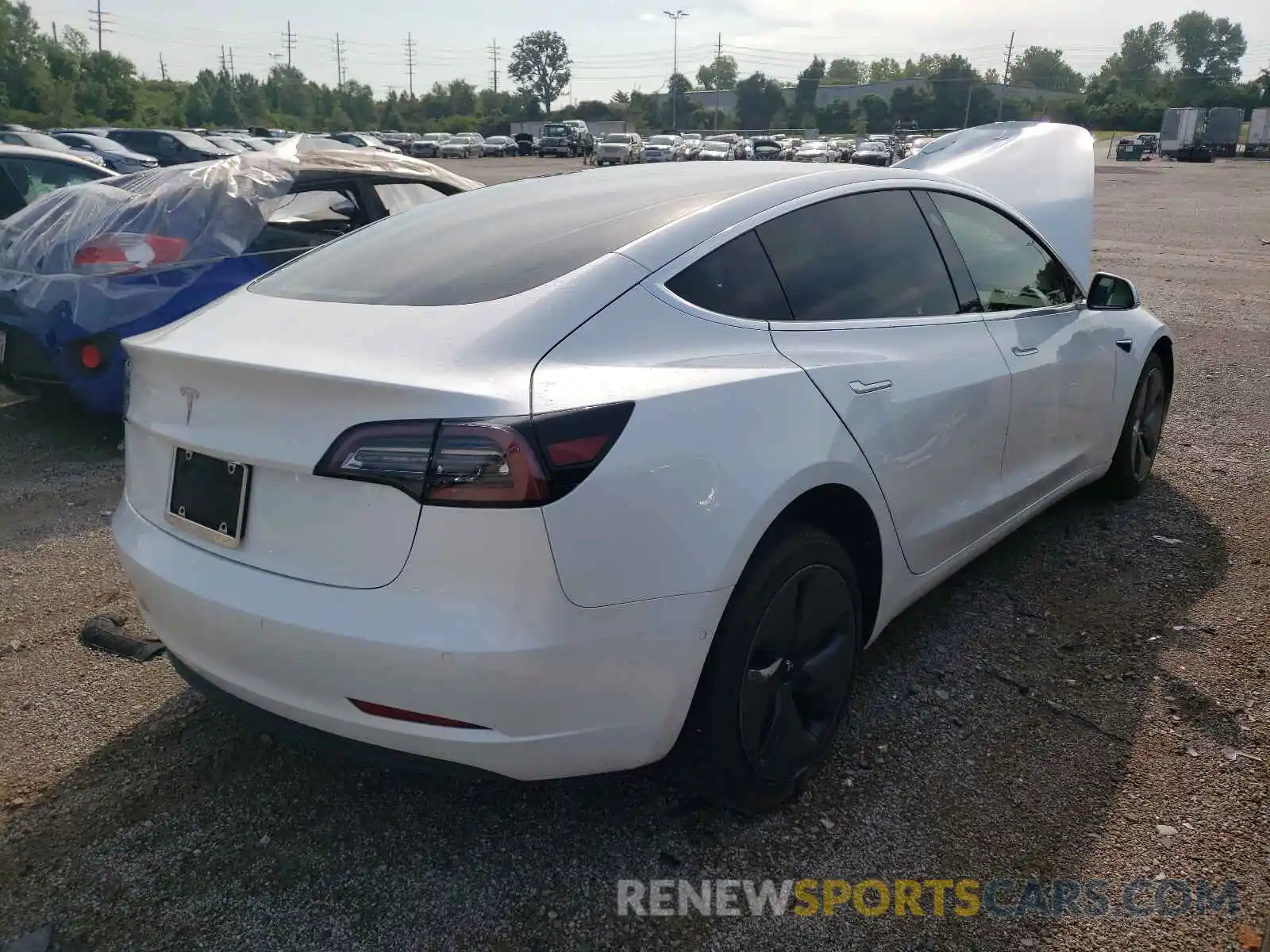 4 Photograph of a damaged car 5YJ3E1EA9LF599007 TESLA MODEL 3 2020