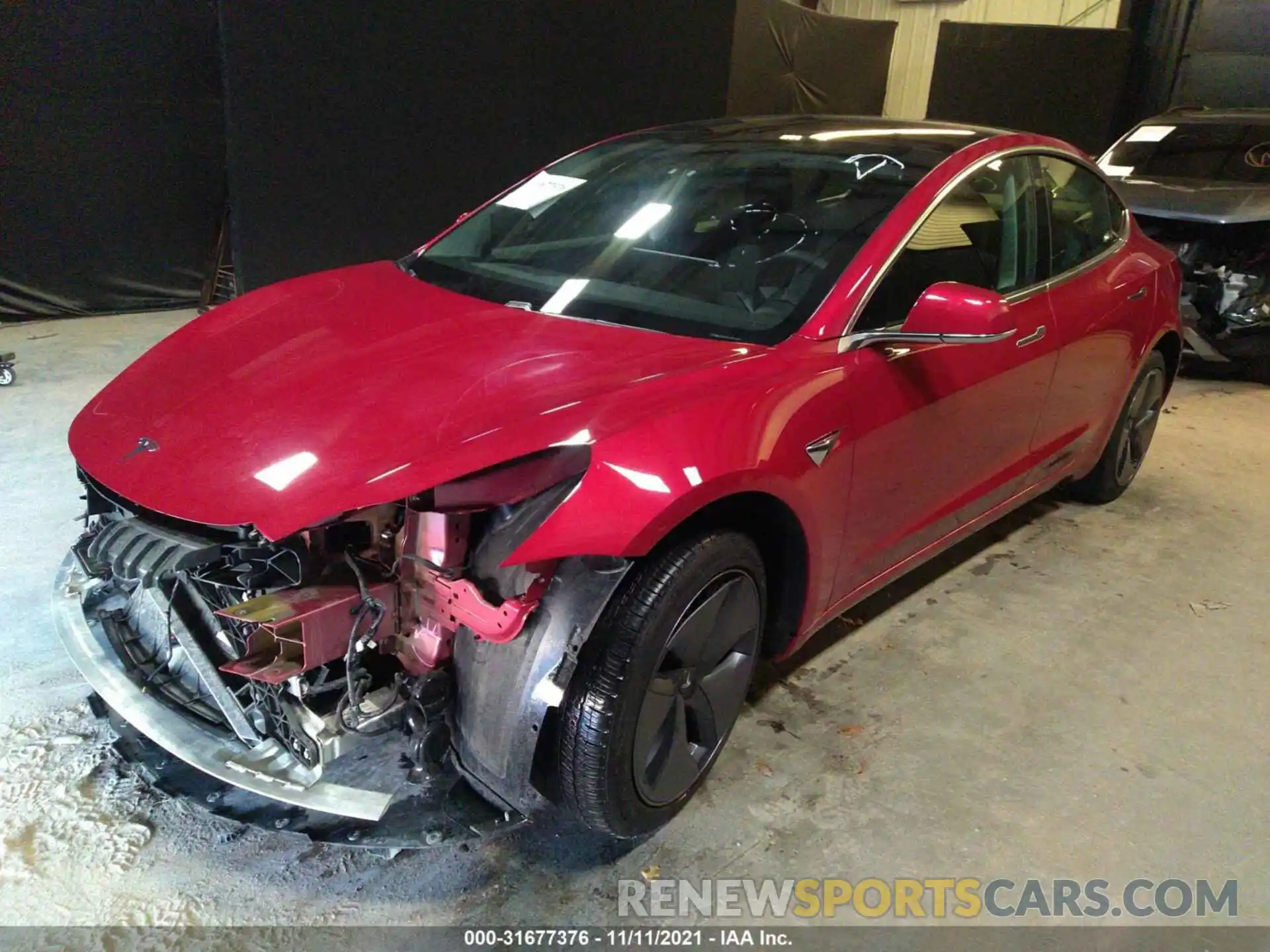 2 Photograph of a damaged car 5YJ3E1EA9LF606585 TESLA MODEL 3 2020