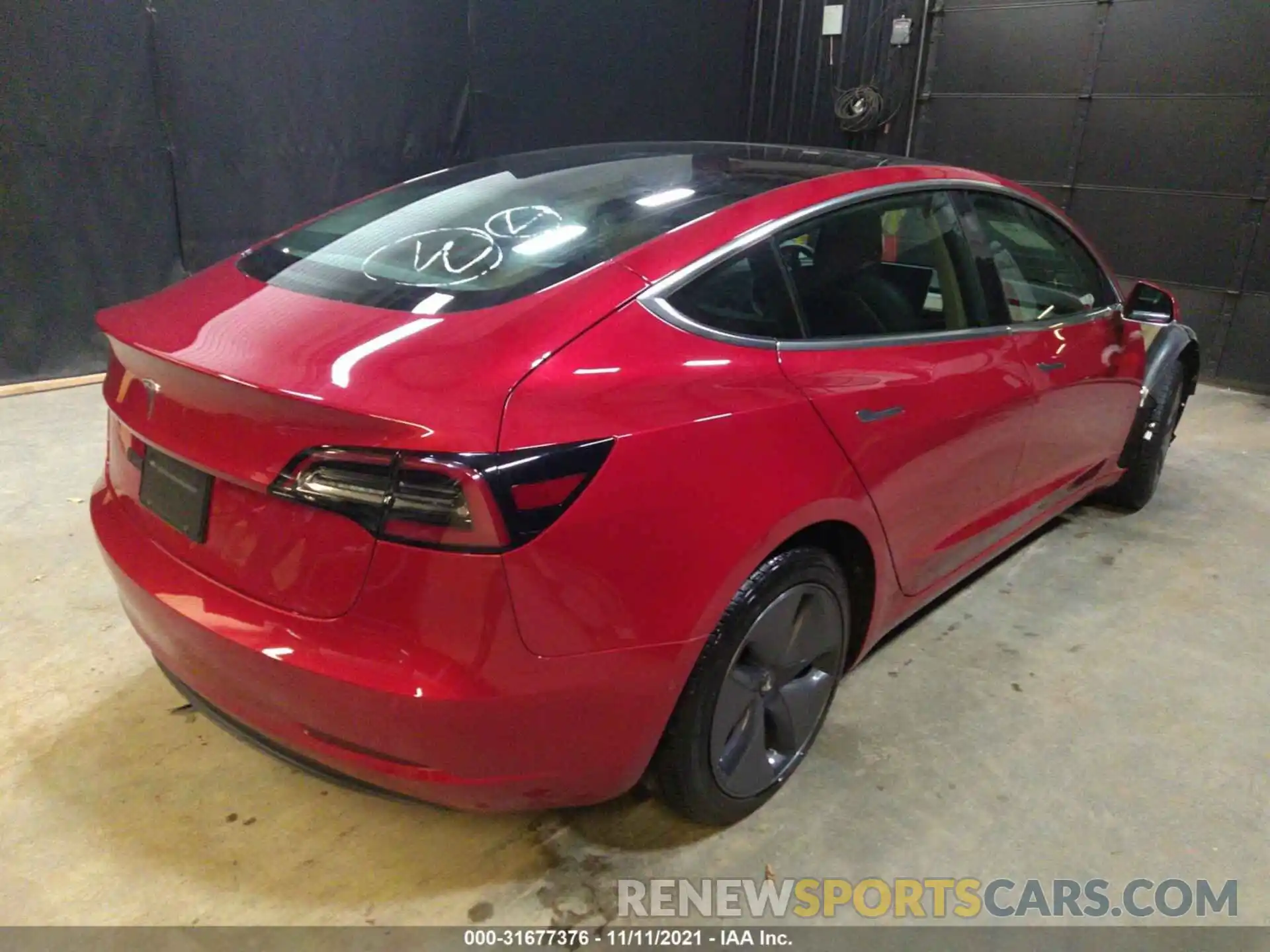 4 Photograph of a damaged car 5YJ3E1EA9LF606585 TESLA MODEL 3 2020