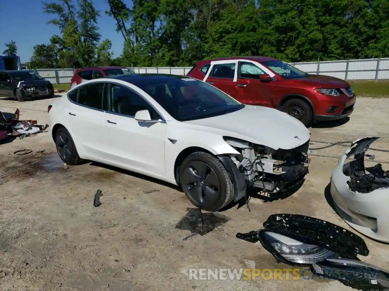 4 Photograph of a damaged car 5YJ3E1EA9LF612595 TESLA MODEL 3 2020