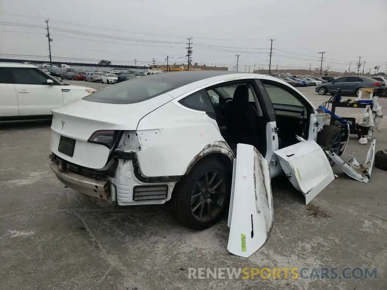 4 Photograph of a damaged car 5YJ3E1EA9LF613018 TESLA MODEL 3 2020