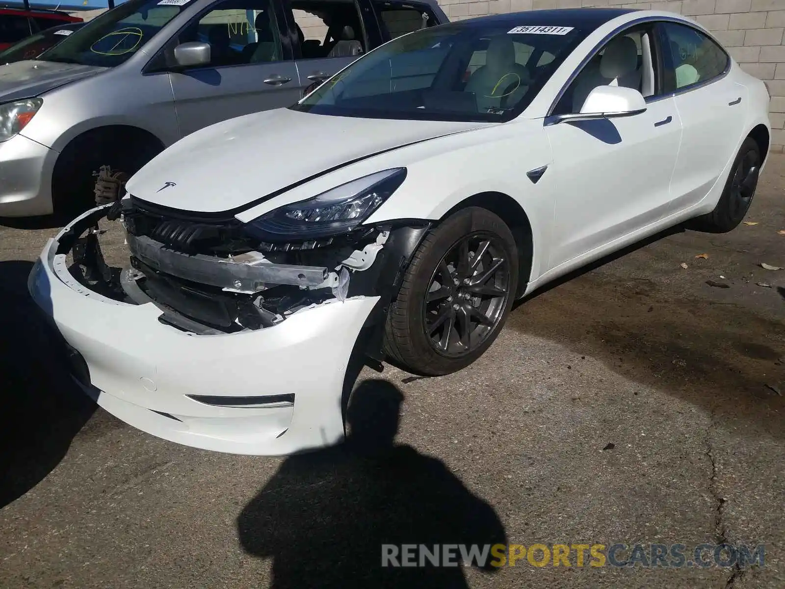 2 Photograph of a damaged car 5YJ3E1EA9LF615495 TESLA MODEL 3 2020