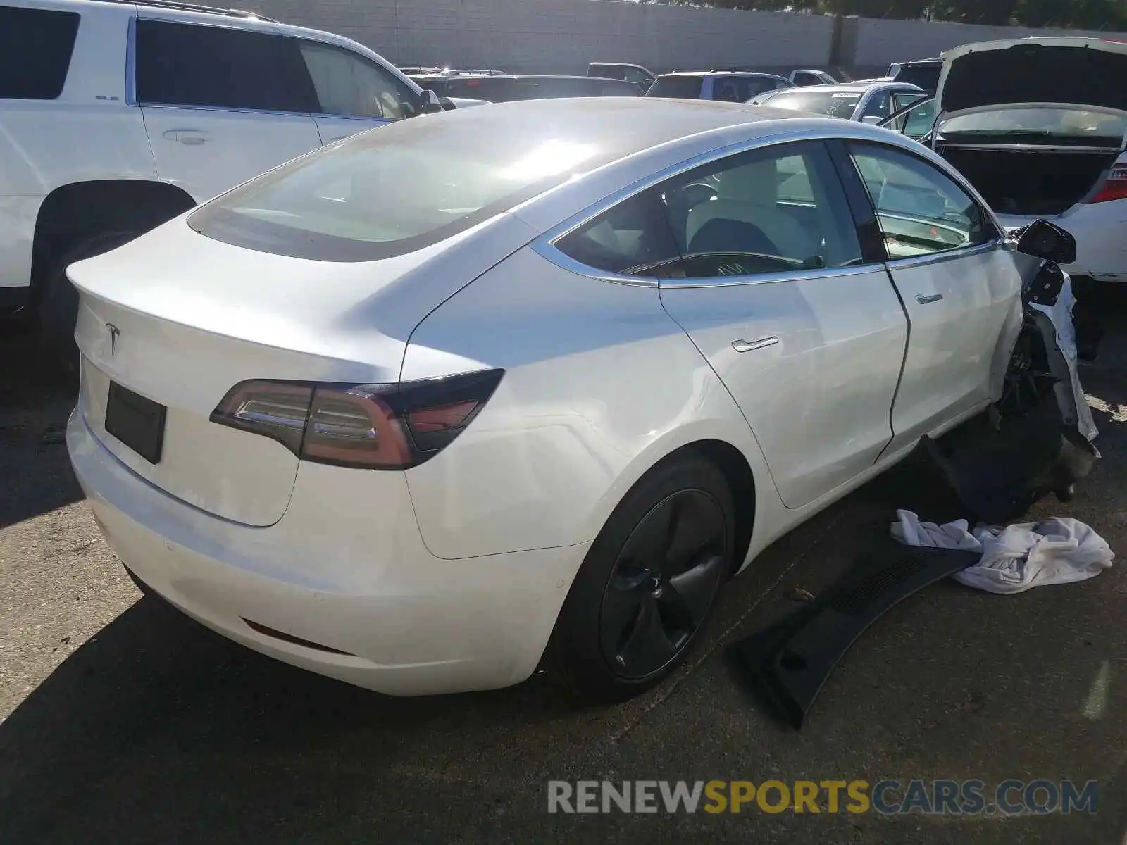 4 Photograph of a damaged car 5YJ3E1EA9LF615495 TESLA MODEL 3 2020