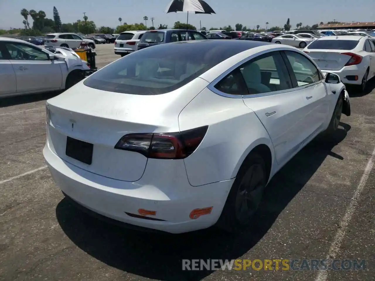 4 Photograph of a damaged car 5YJ3E1EA9LF615691 TESLA MODEL 3 2020