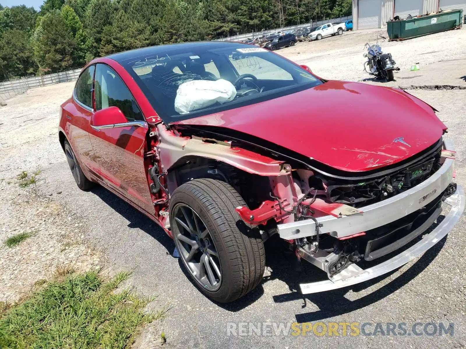 1 Photograph of a damaged car 5YJ3E1EA9LF703561 TESLA MODEL 3 2020