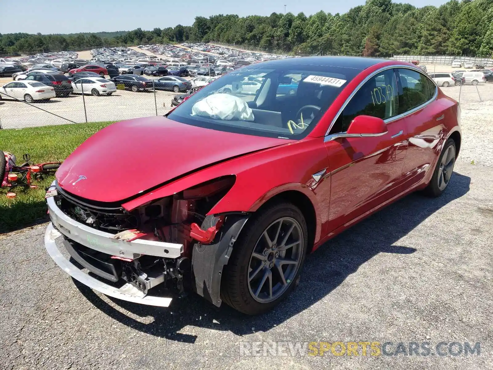 2 Photograph of a damaged car 5YJ3E1EA9LF703561 TESLA MODEL 3 2020