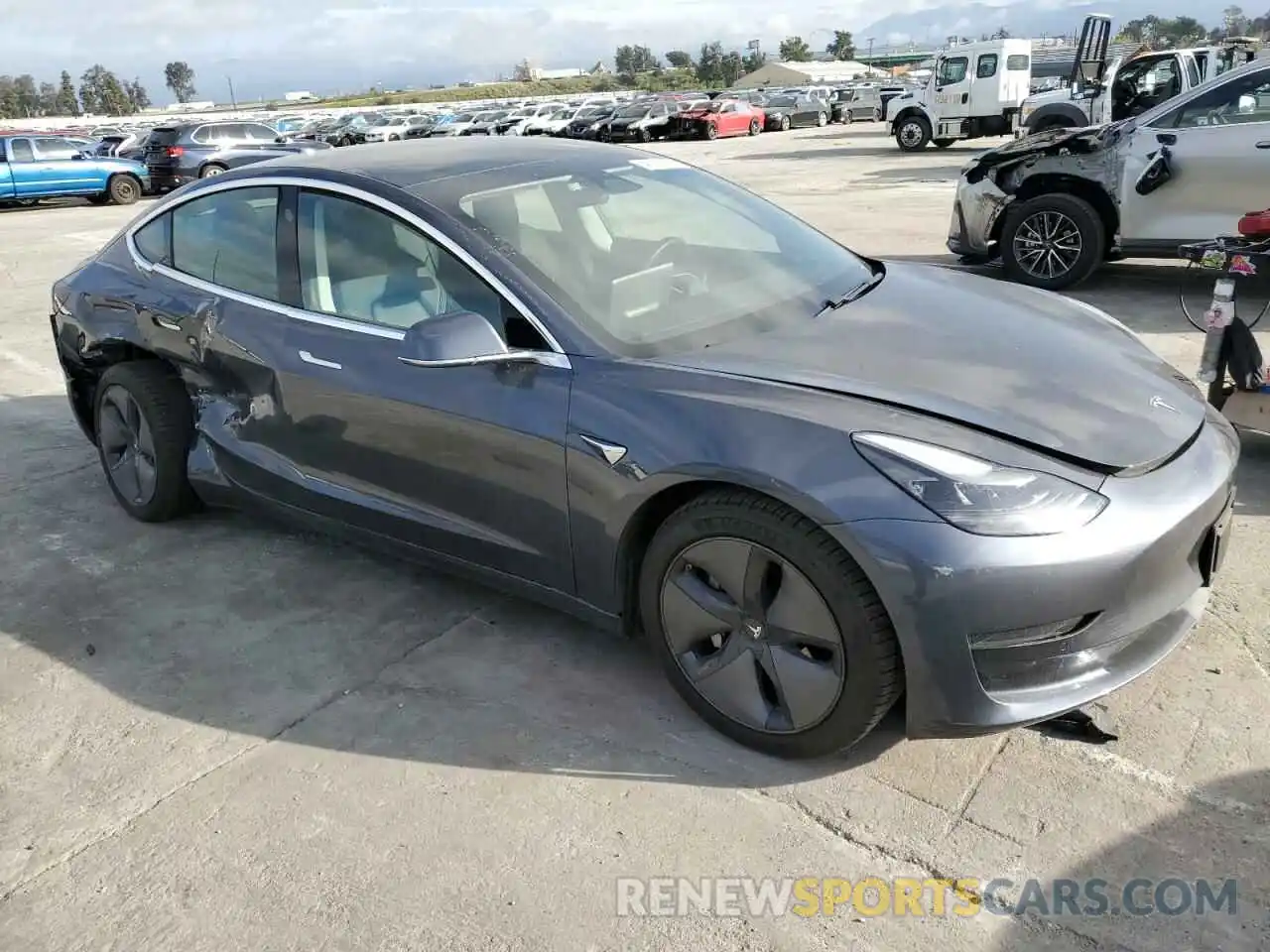 4 Photograph of a damaged car 5YJ3E1EA9LF705164 TESLA MODEL 3 2020